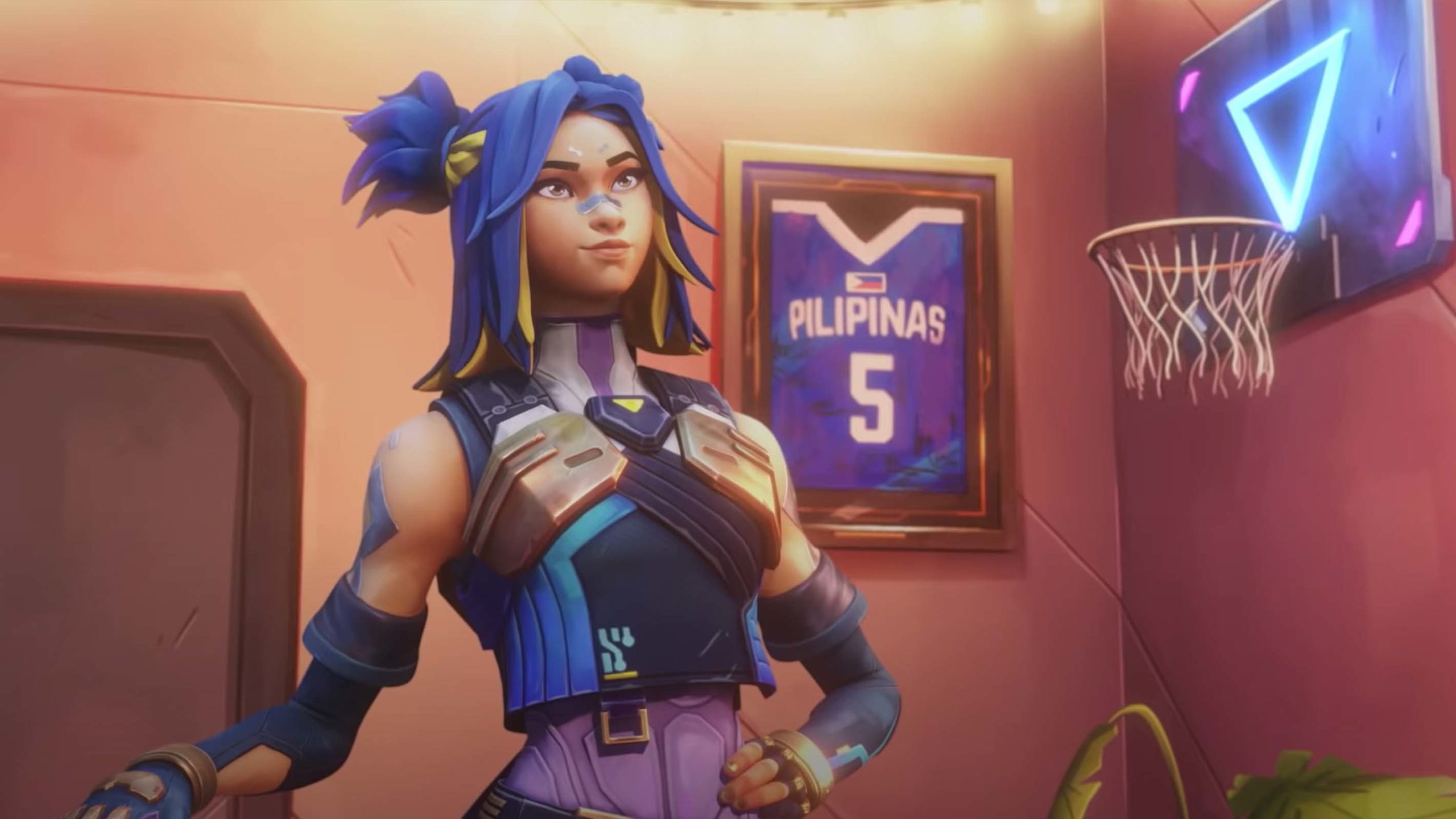 A framed jersey and a mini basketball hoop to pass the time are two of arguably the most Filipino wall decors Neon has in her room.