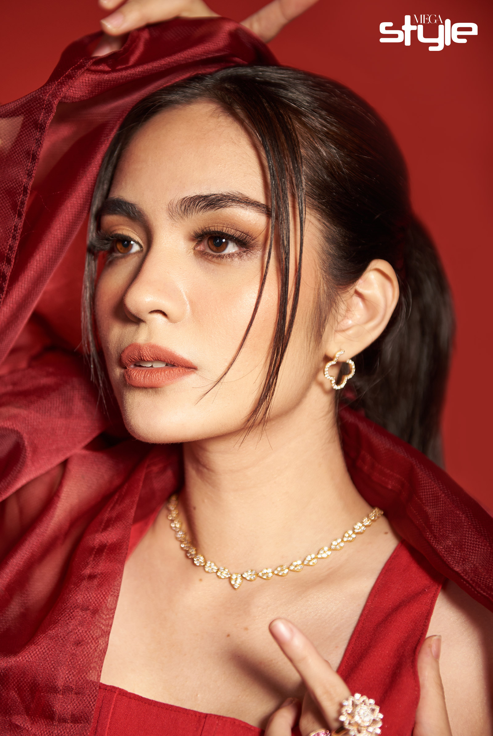 Angela Alarcon wearing YOU Beauty Rouge Power Lip Matte in Inspire