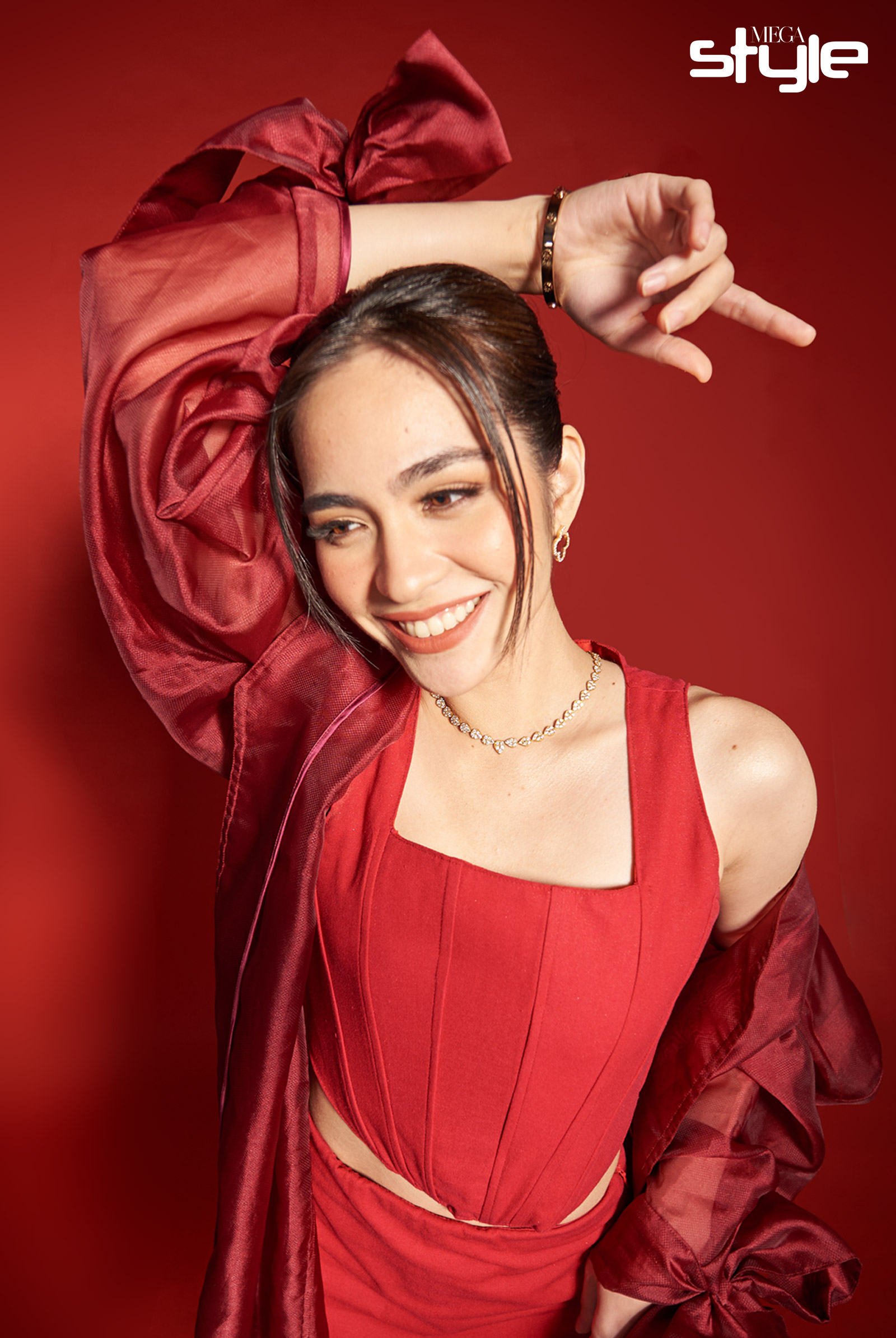 Angela Alarcon wearing YOU Beauty Rouge Power Lip Matte in Inspire