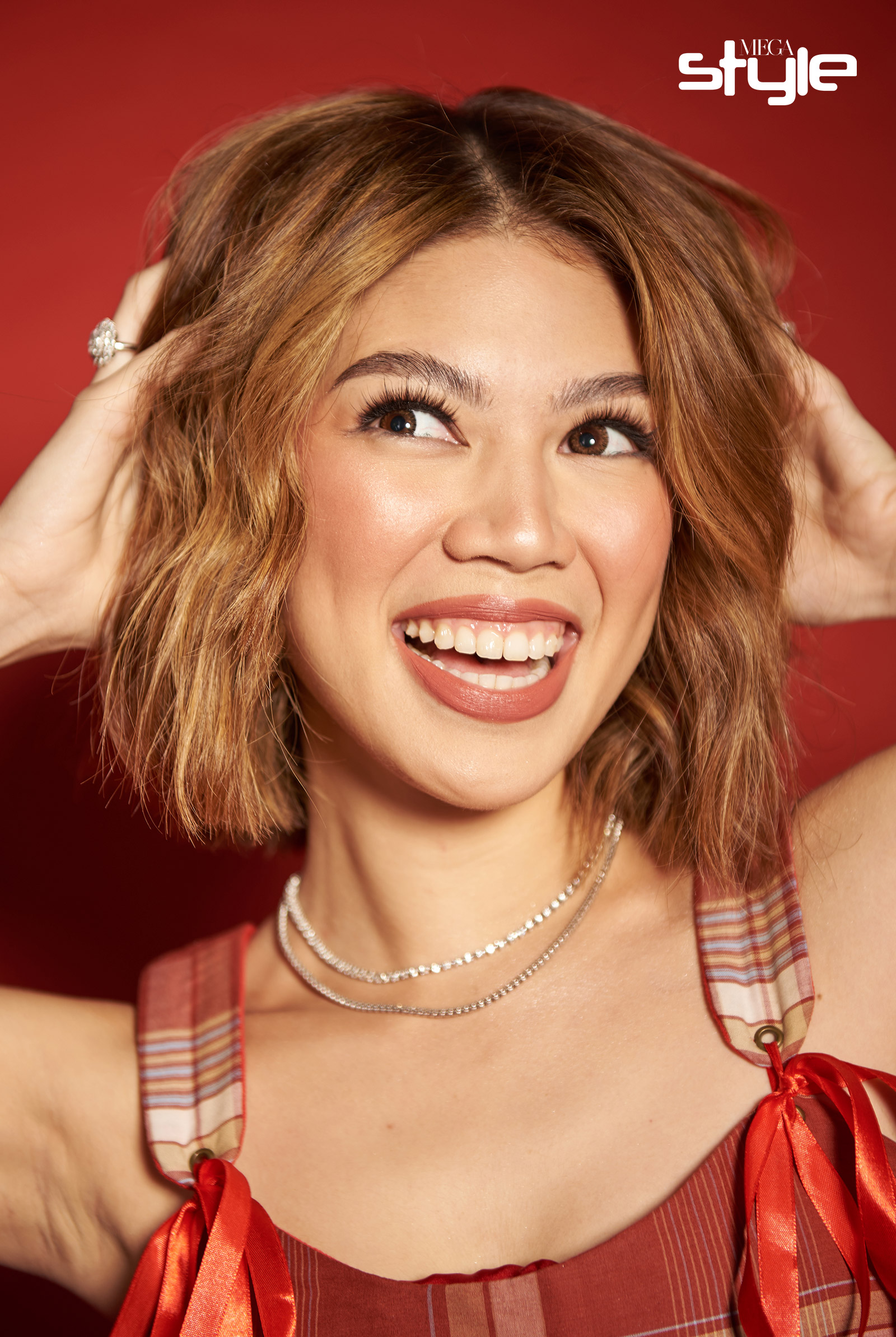Janina Vela wearing YOU Beauty Rouge Power Lip Matte in Whisper