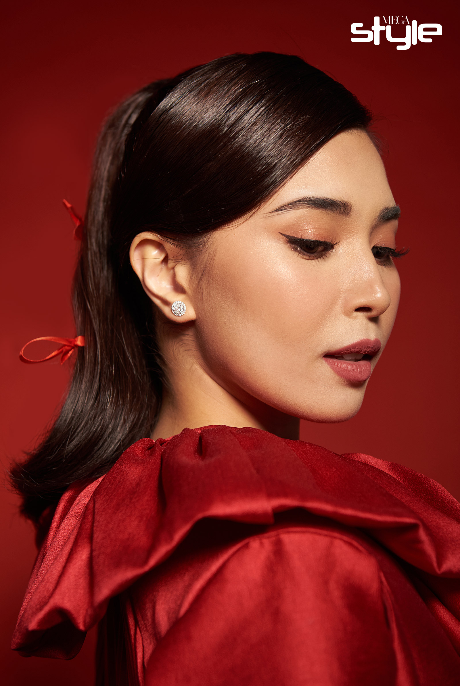 Kamille Zulueta wearing YOU Beauty Rouge Matte Lipstick in the shade Kindness
