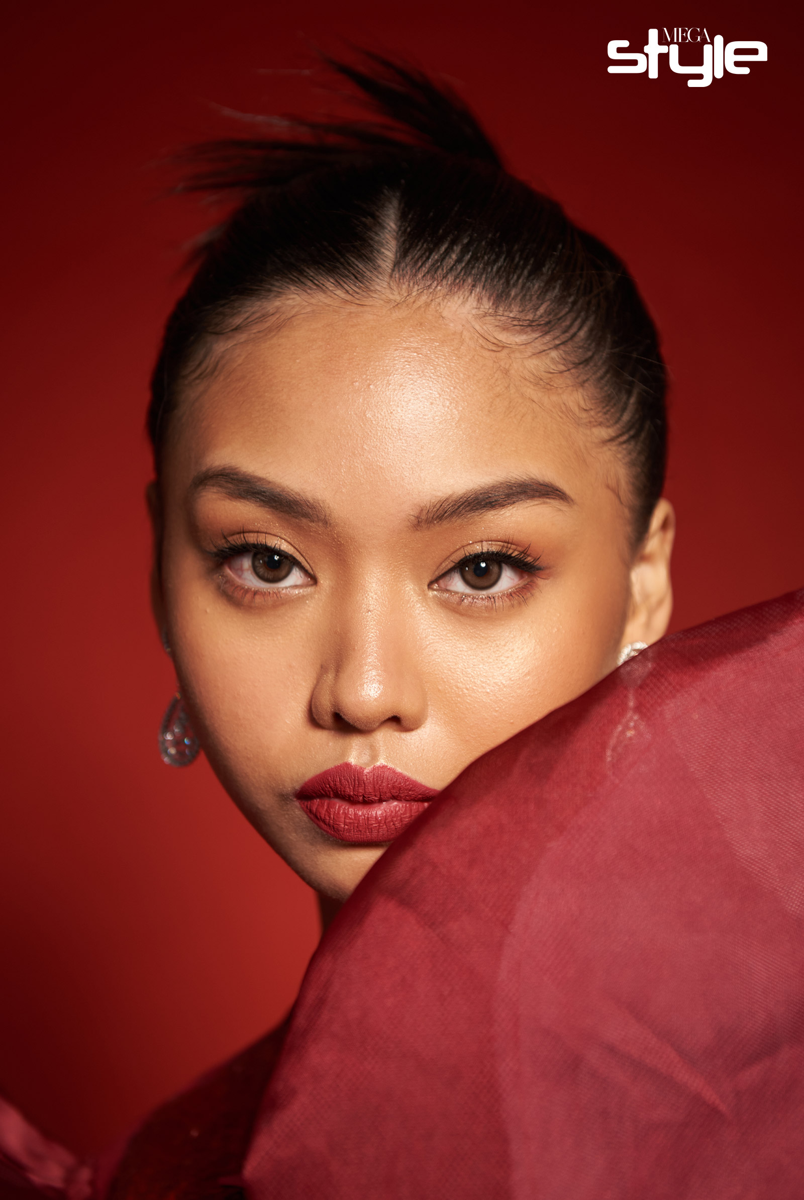 Kira Manansala wearing YOU Beauty Rouge Power Lip Matte in Passion