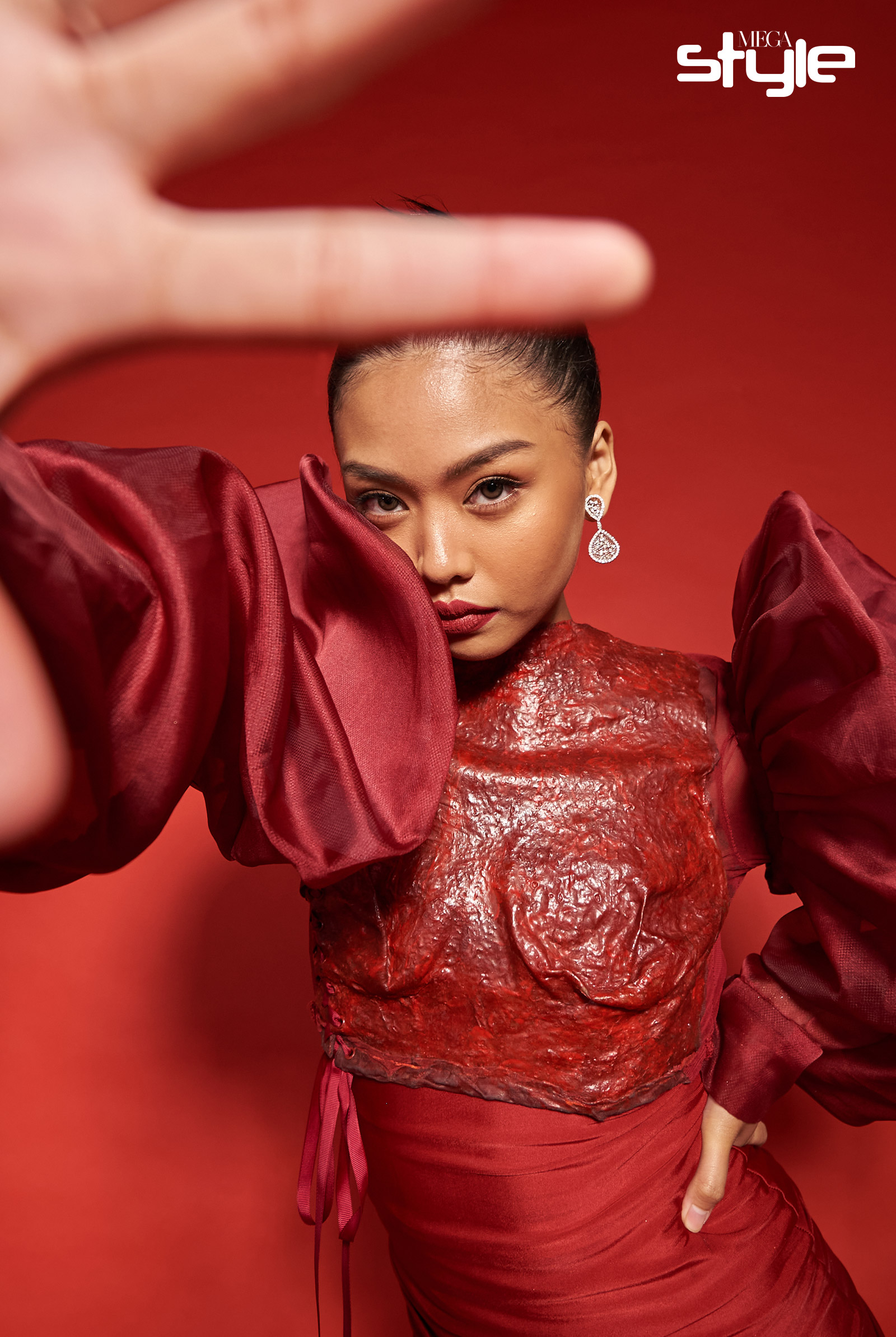 Kira Manansala wearing YOU Beauty Rouge Power Lip Matte in Passion