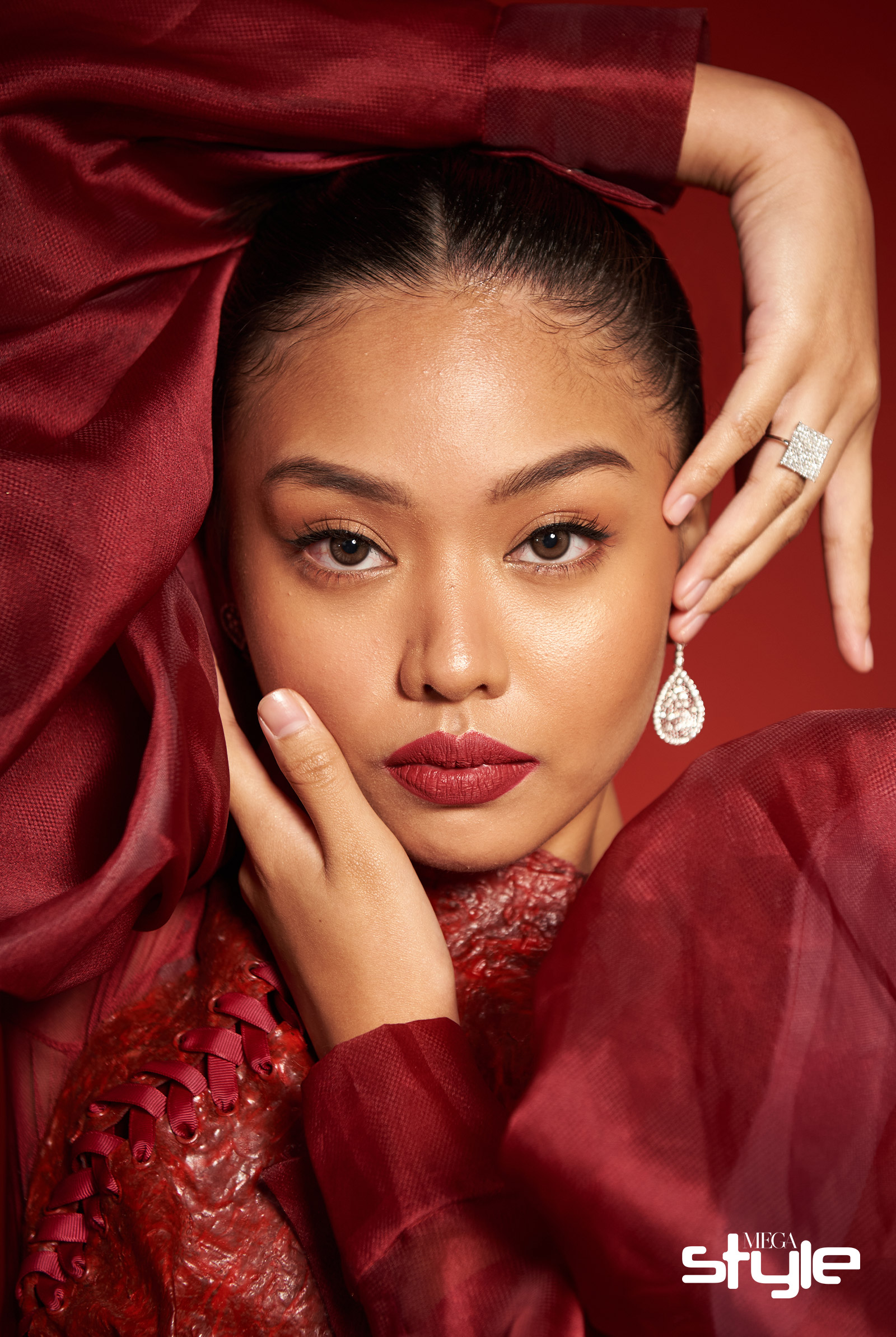 Kira Manansala wearing YOU Beauty Rouge Power Lip Matte in Passion
