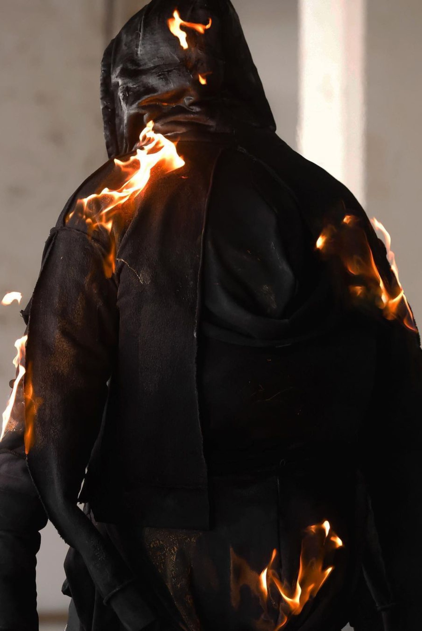 Model Covered in Fire Paris Fashion Week