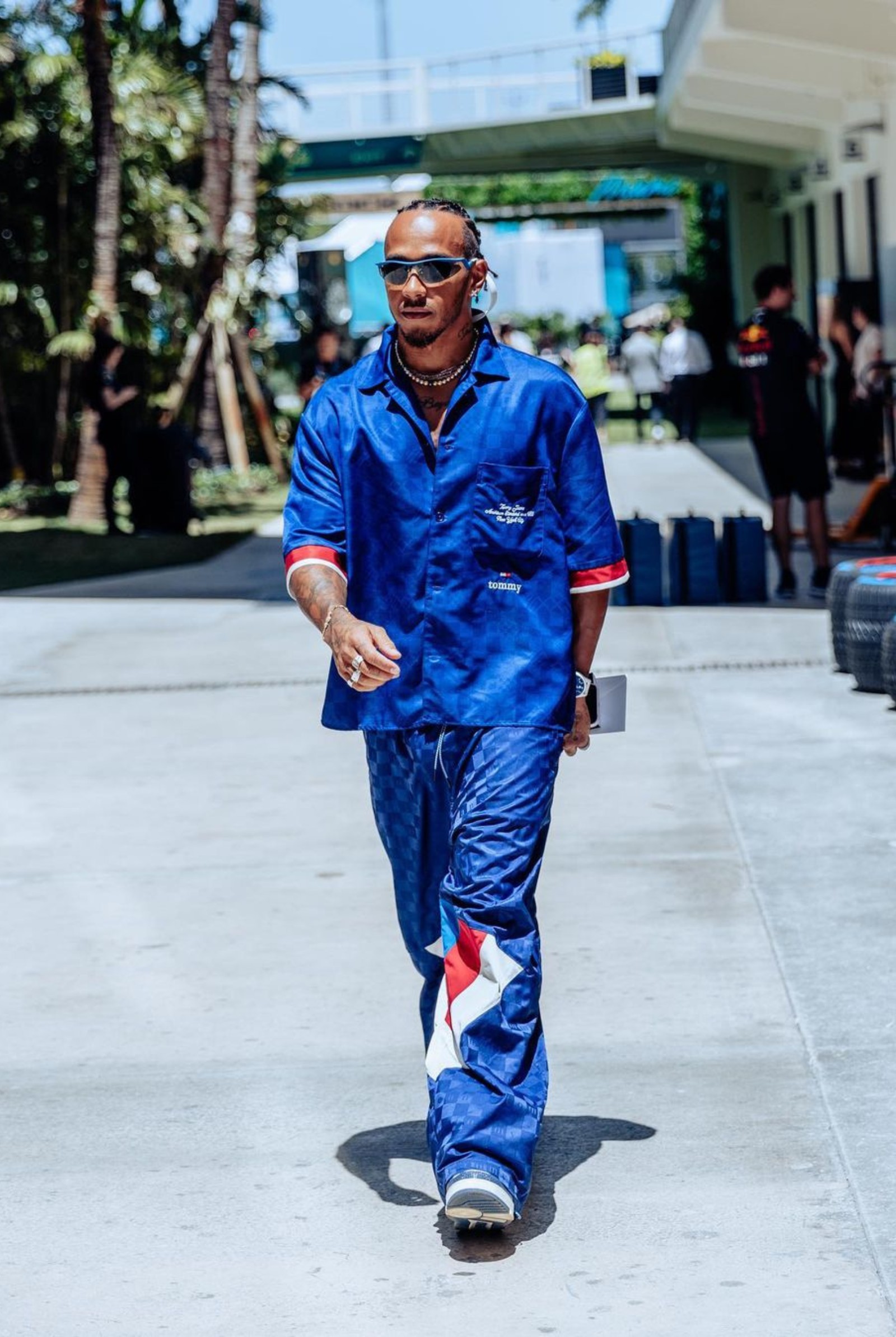 Lewis Hamilton wearing Tommy Jeans checkerboard twill shirt and eye-catching color-blocked jacquard joggers