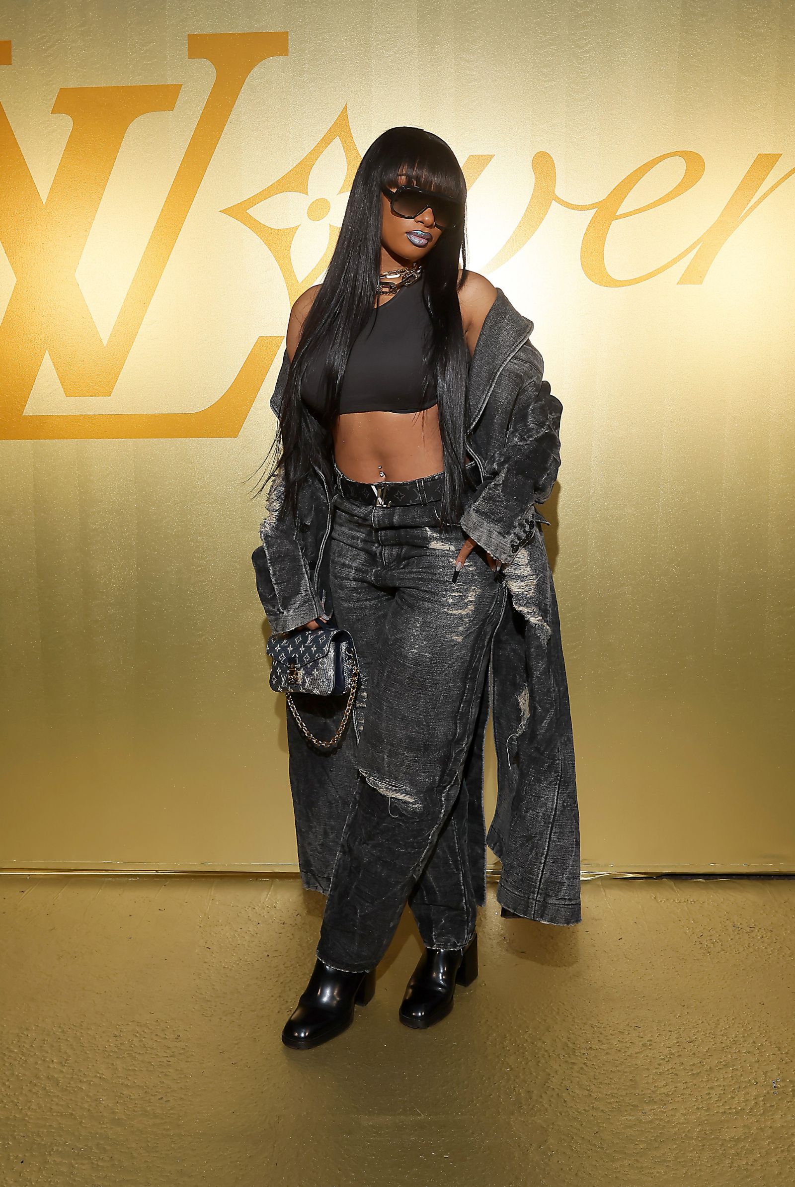 Megan Thee Stallion in Pharrell's Spring Summer Louis Vuitton Debut 