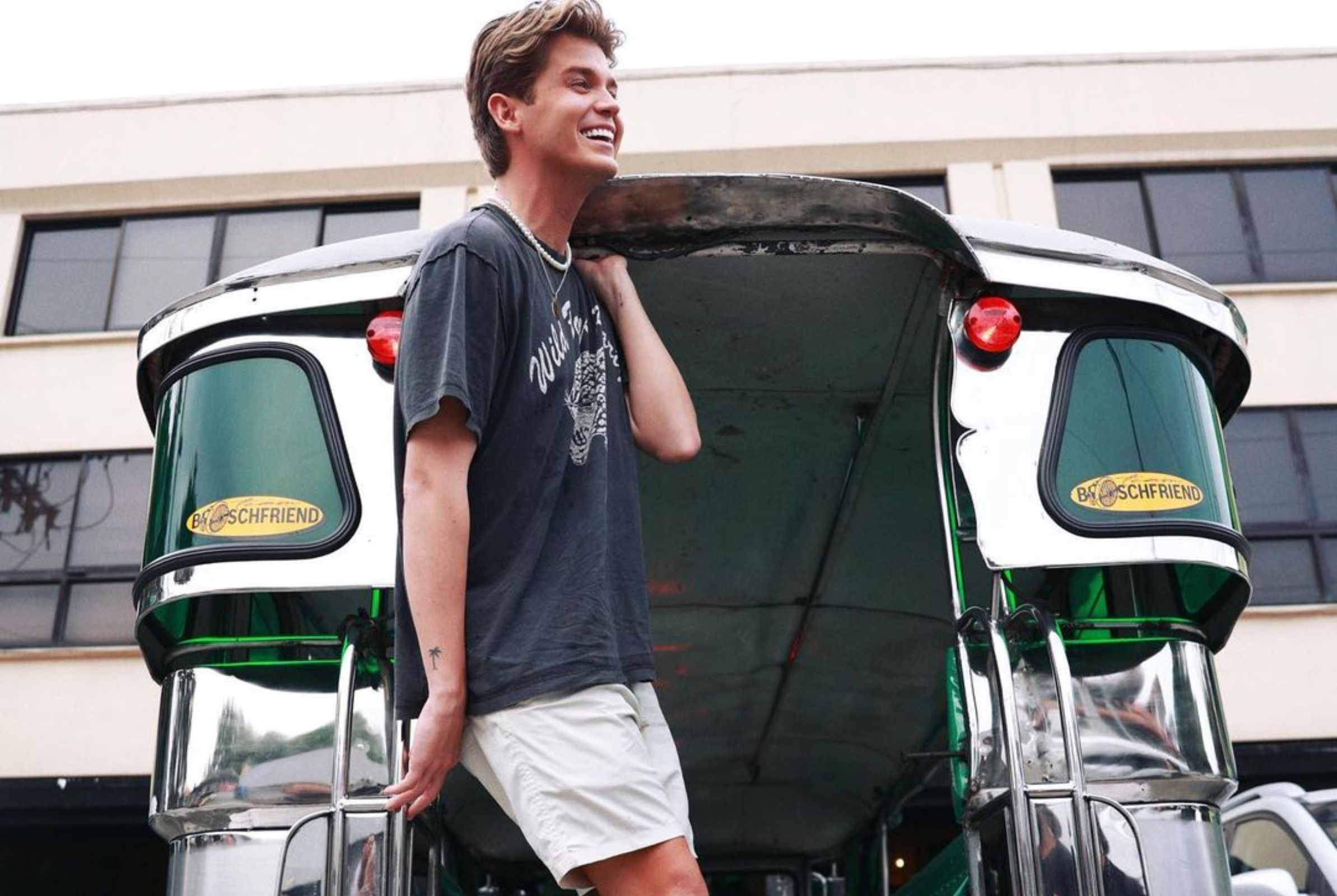 Jamie Miller Riding a jeepney