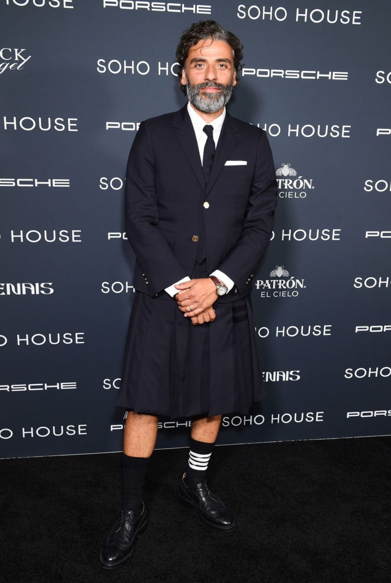 Oscaar Isaac wearing men's skirts for Thom Browne