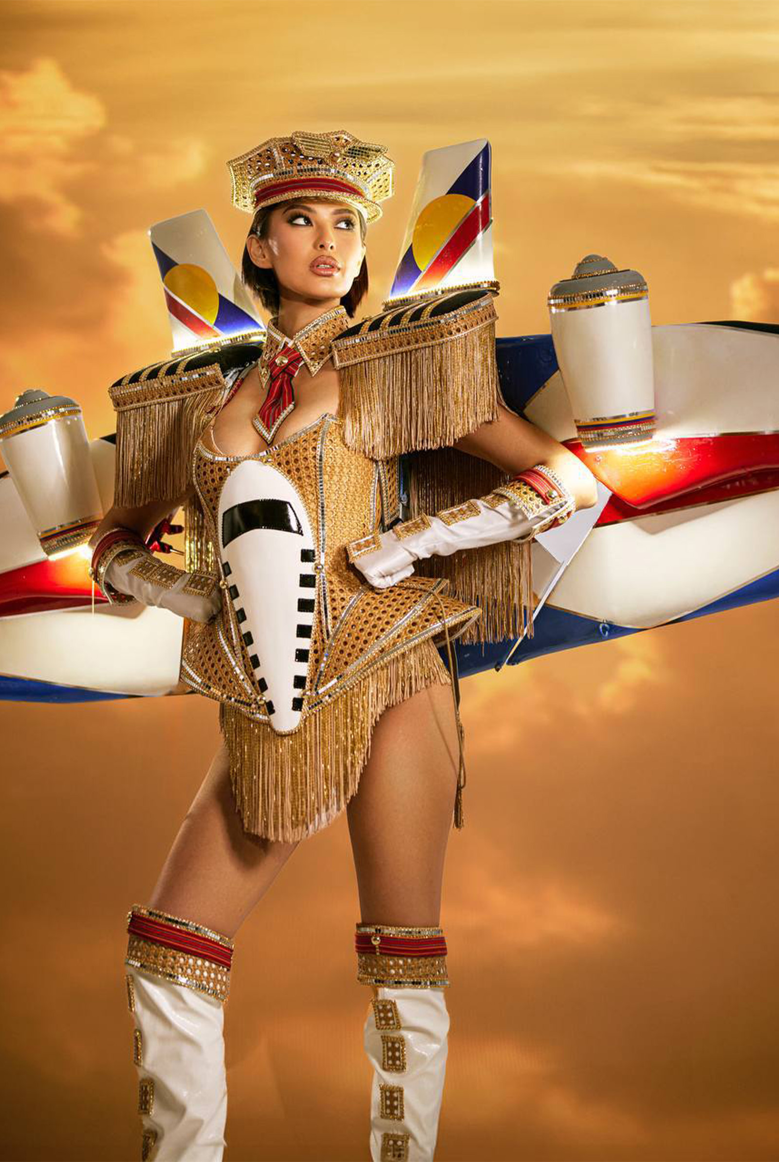 Behind Michelle Dee's Miss Universe National Costume