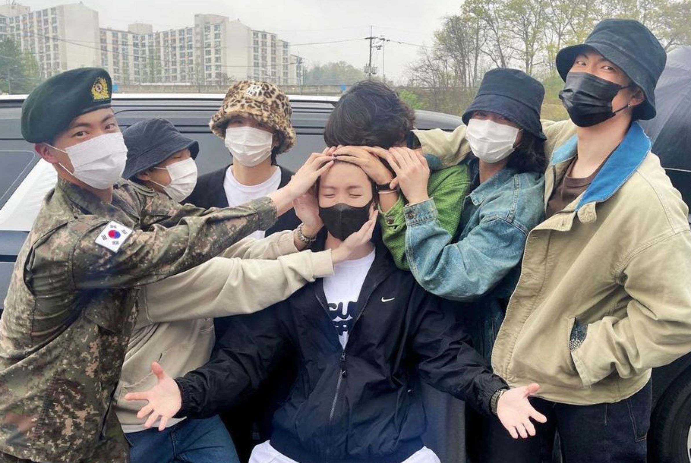 BTS members bid farewell to J-Hope as he leaves for the military