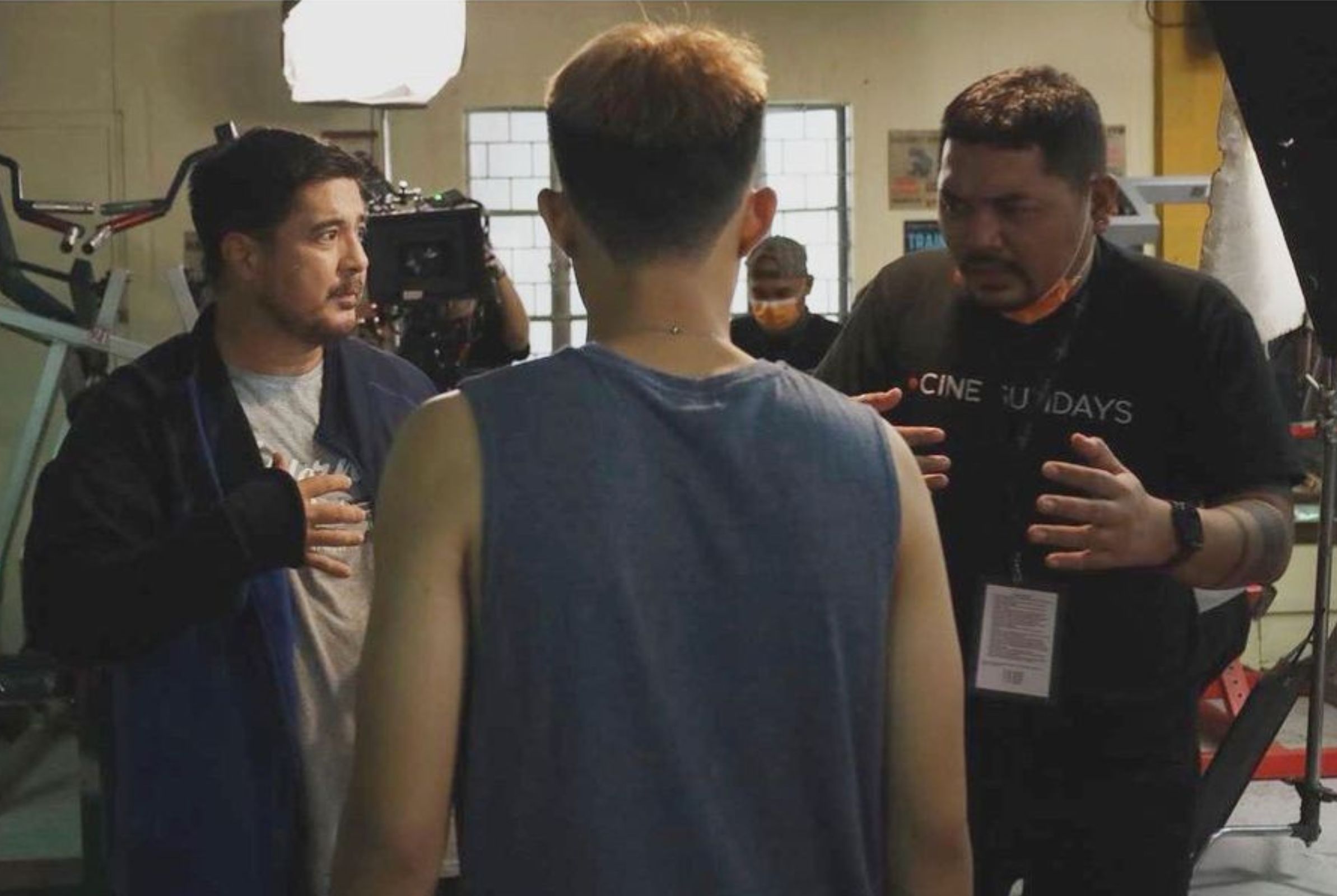 The director with Aga Muhlach and Elijah Canlas on the set of Suntok Sa Buwan