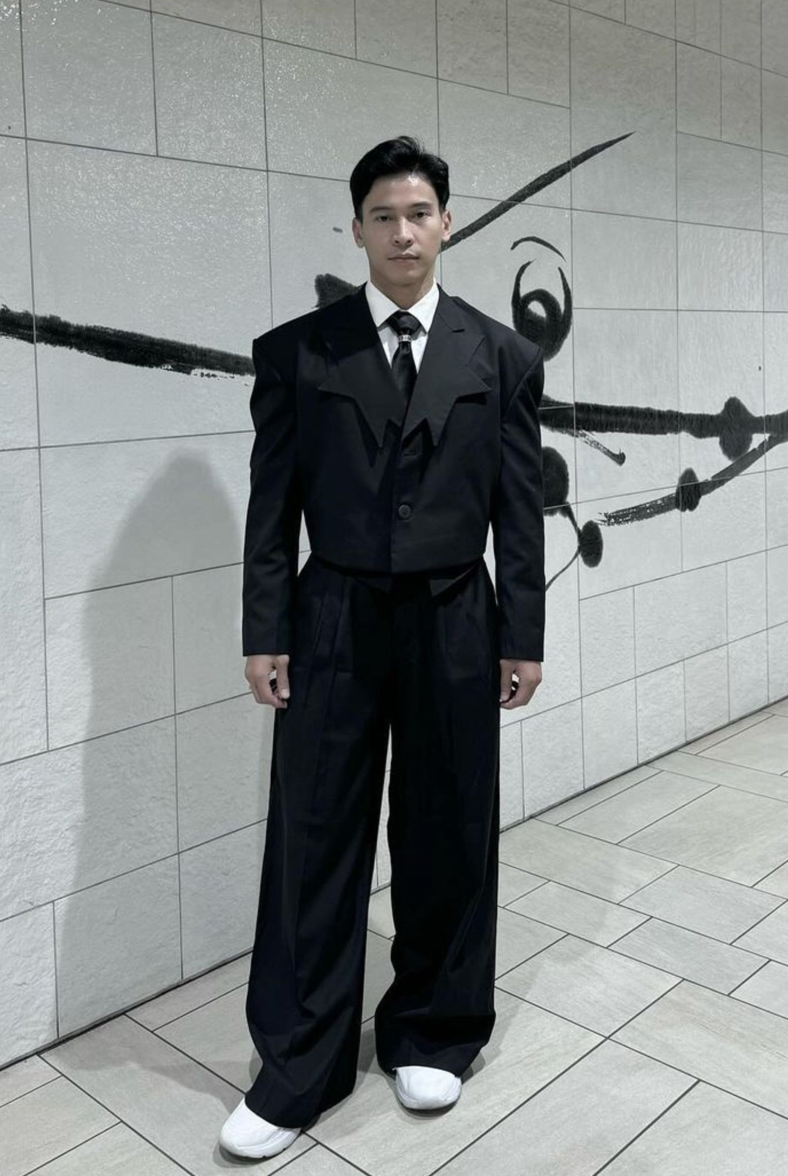 Stealing the spotlight at the Tokyo Film Festival, Enchong sports a look by Randolf Clothing