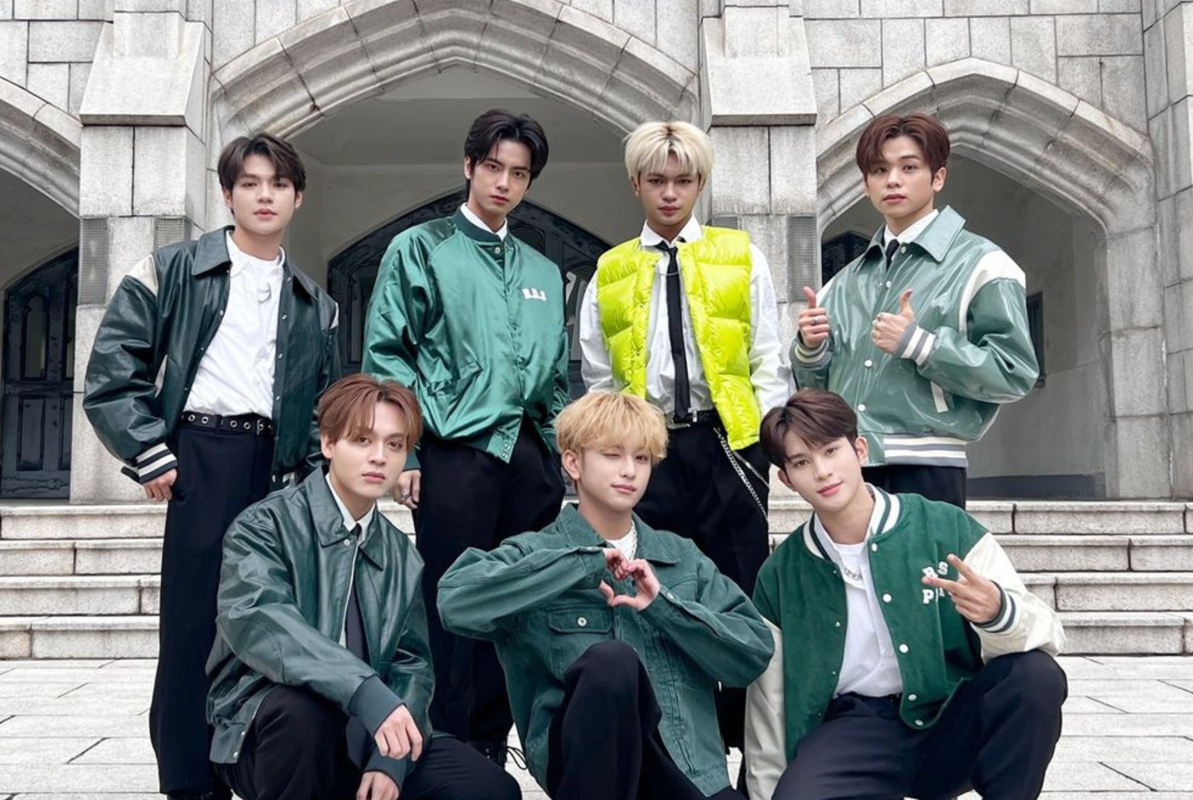 The Filipino boy group in green ensembles