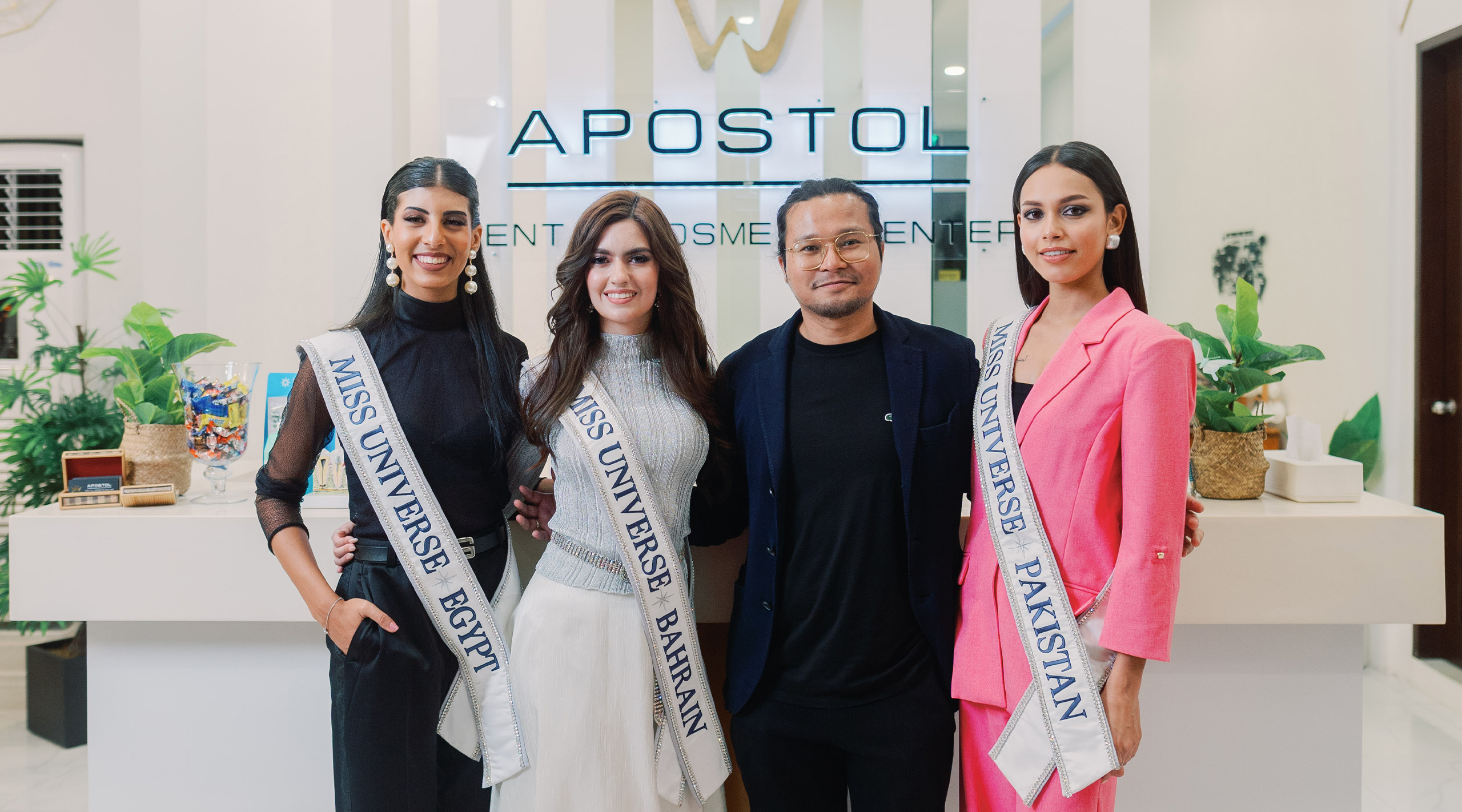 dr. jonas apostol as queenmarker with miss universe beauty queens dentist
