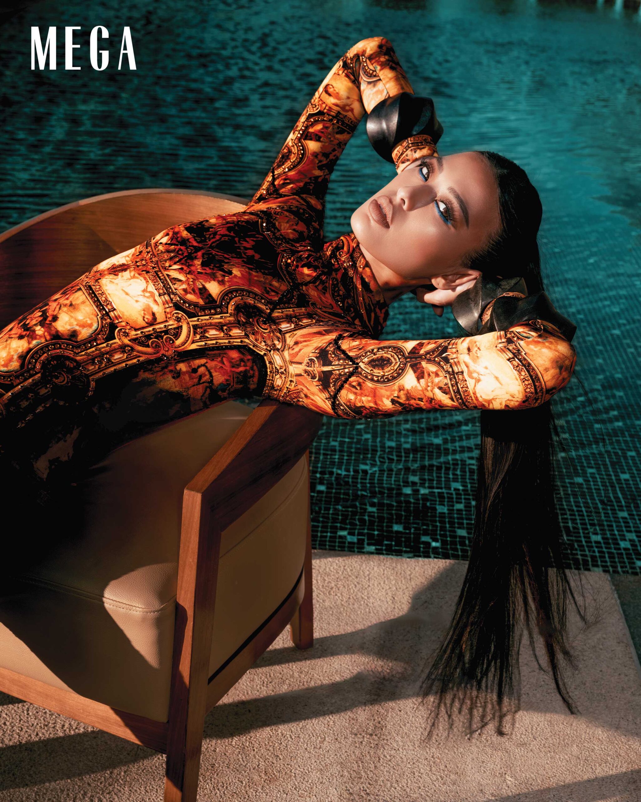 Michelle Dee wears JOB DACON bodysuit and RONALD MABANAG bangles