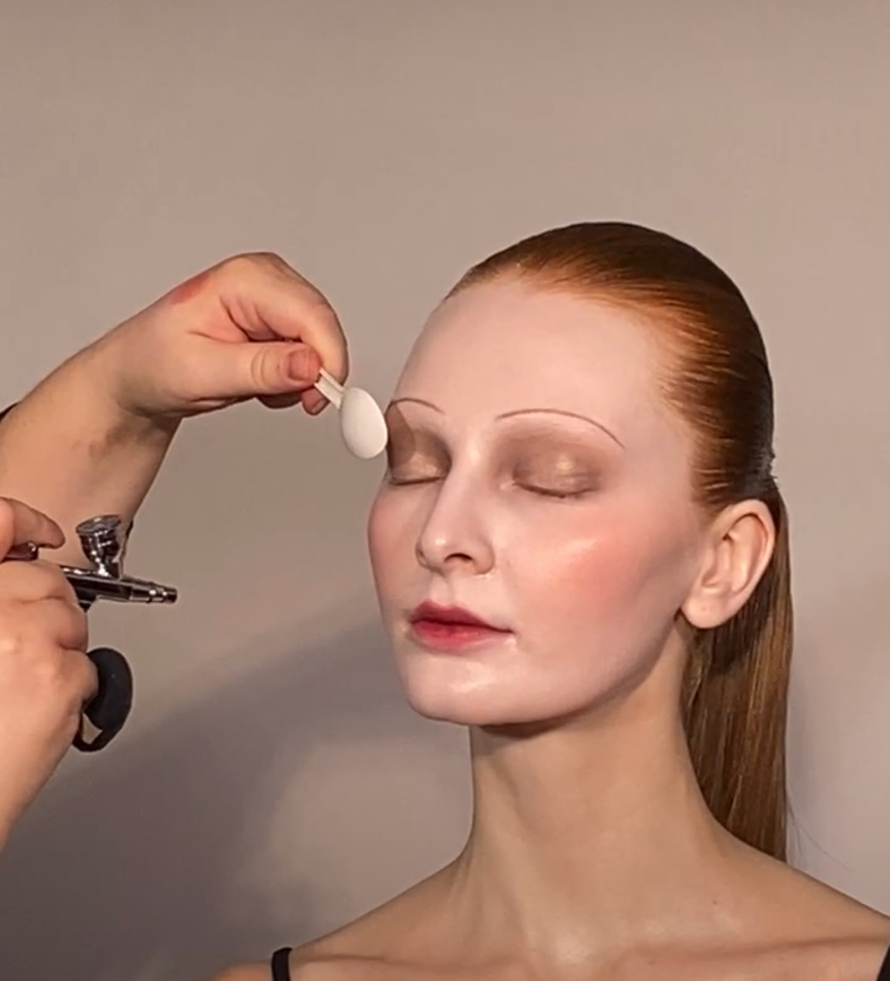 Team Pat McGrath airbrushing Dasha