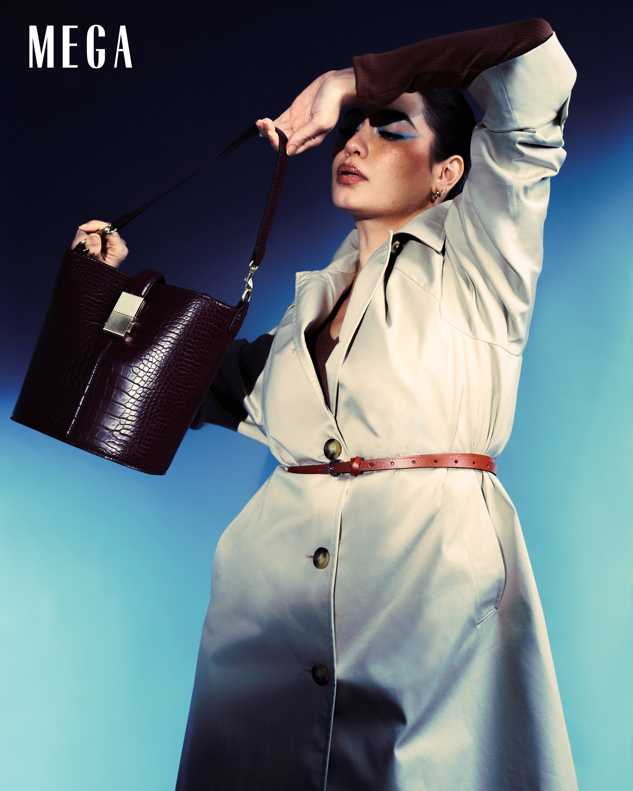 nicole andersson in midi dress and cotton coat from marks and spencer collection