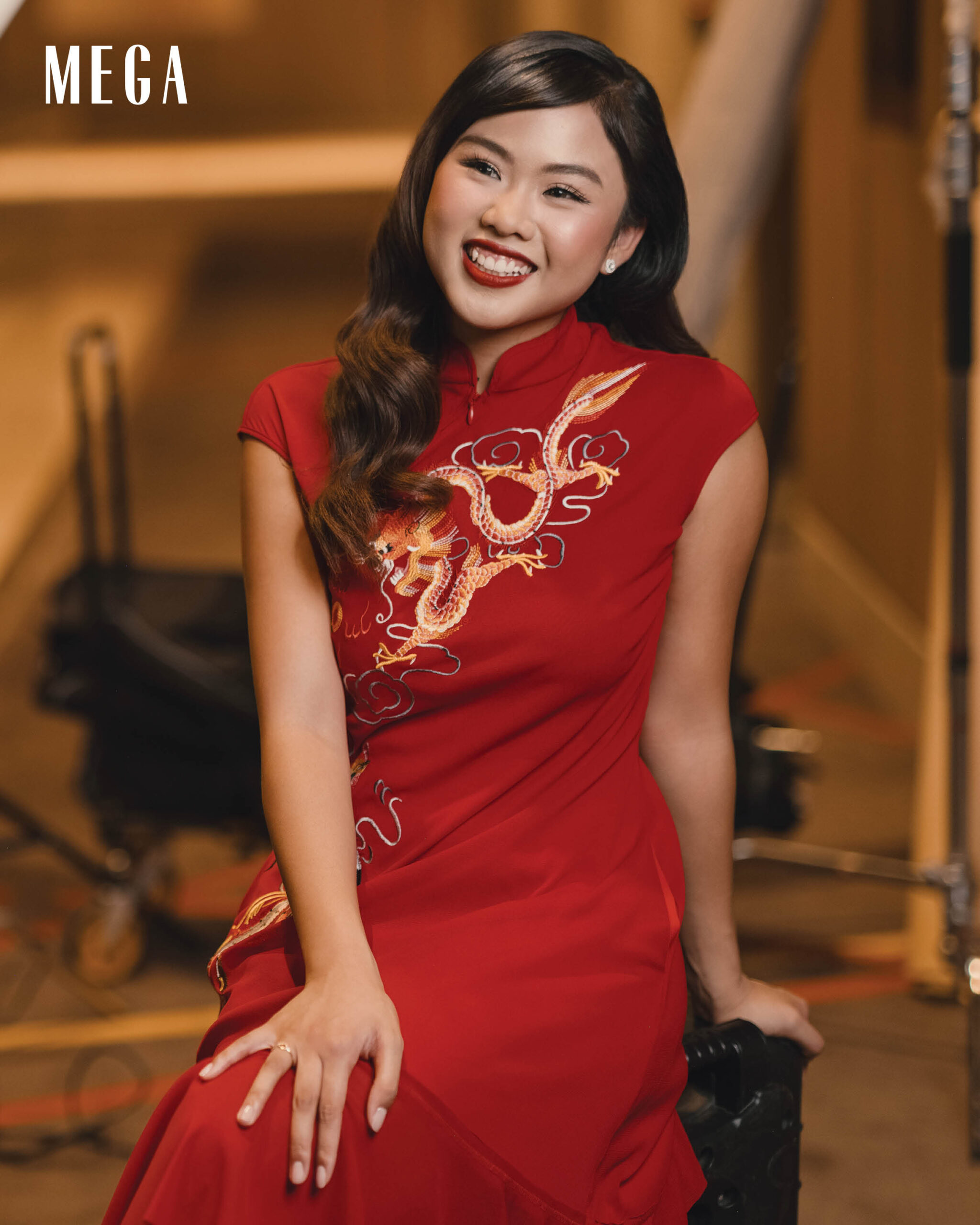 Abigail Adriano is wearing a VIVENNE TAM dress