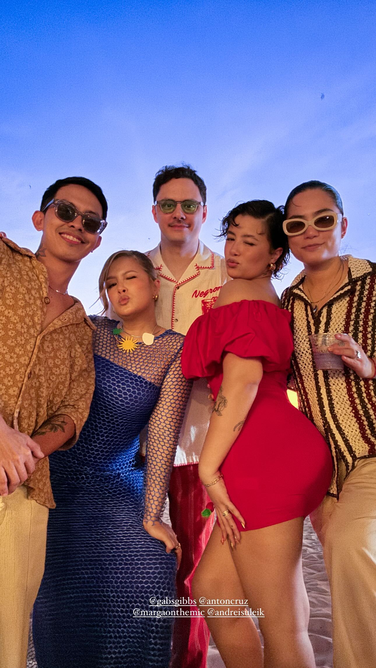 Laureen Uy Miggy Cruz weddings guests Palawan destination fashion style maximalist colors prints beach wedding