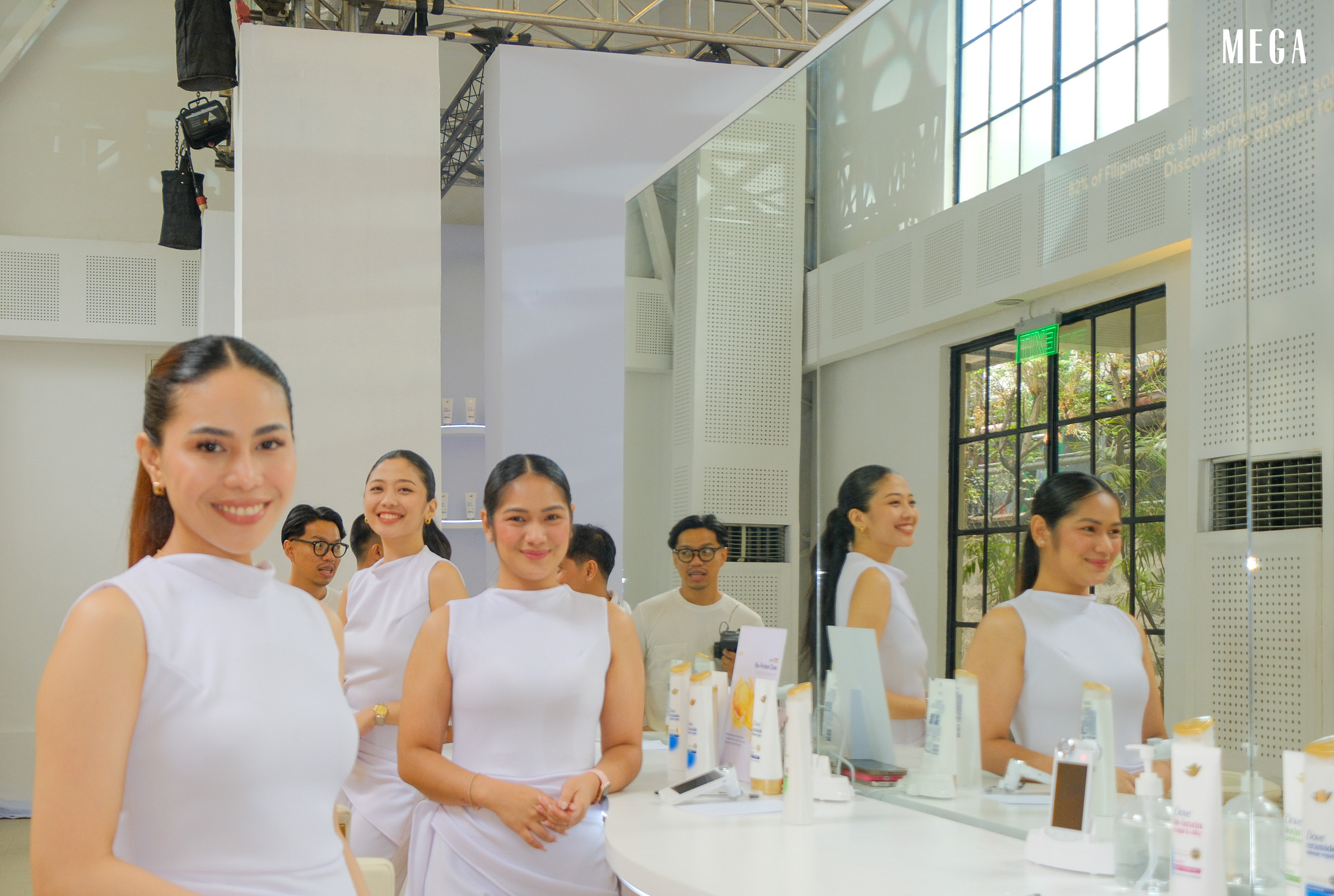 Hair experts at the Dove Hair Care Labs 2.0 assessment station