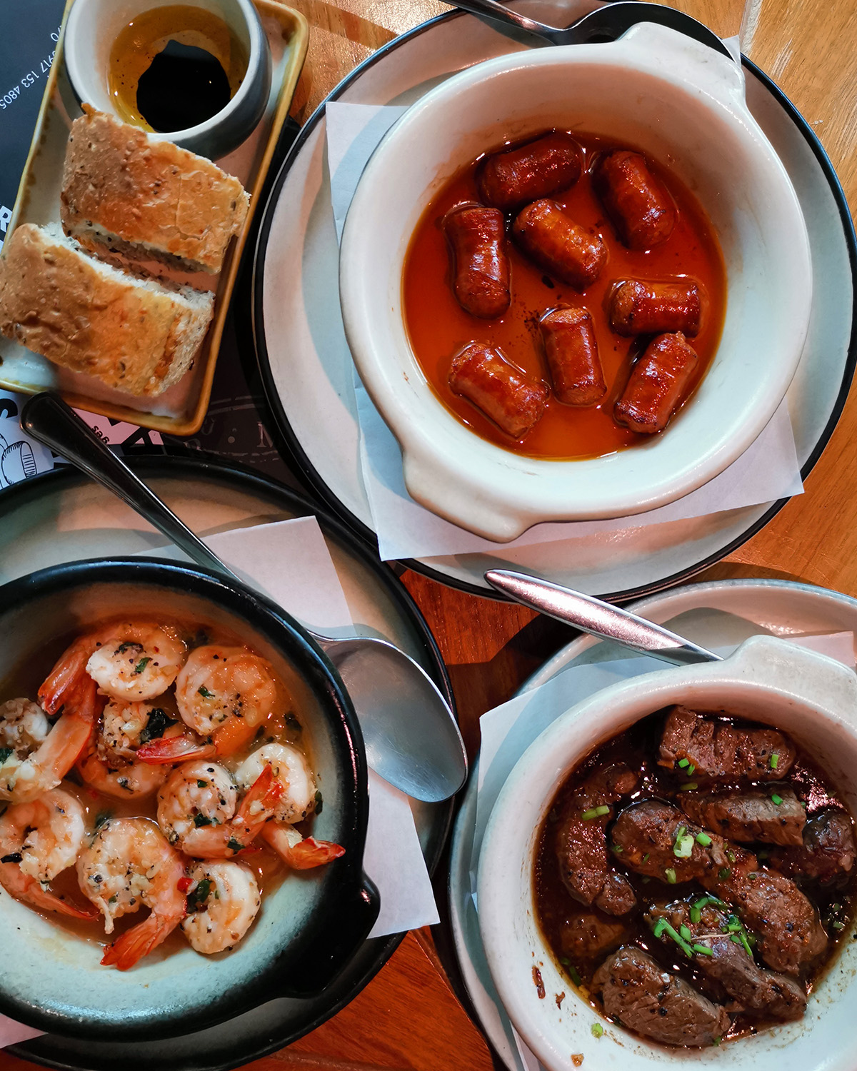 Pablo’s Signature Tapas: Spicy Chorizo Bites, Gambas Al Ajillo, and Salpicao