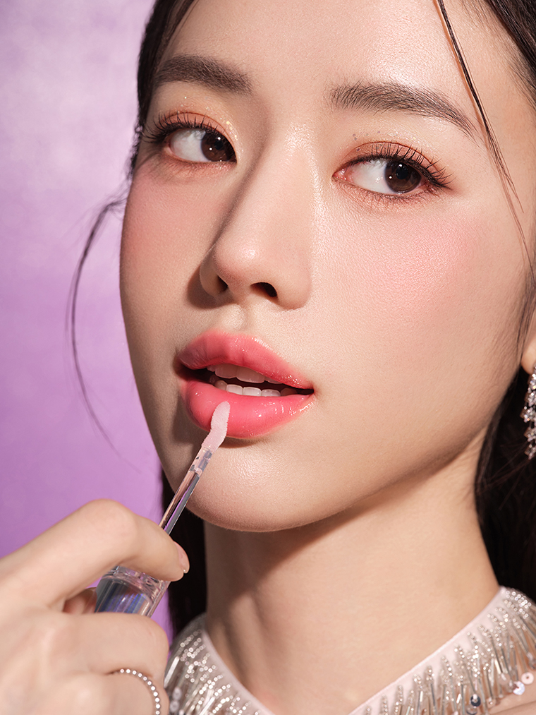 The Plum Makes Plumping Lip Gloss comes in three shades: sheer glitter, plum petal, and bare blossom