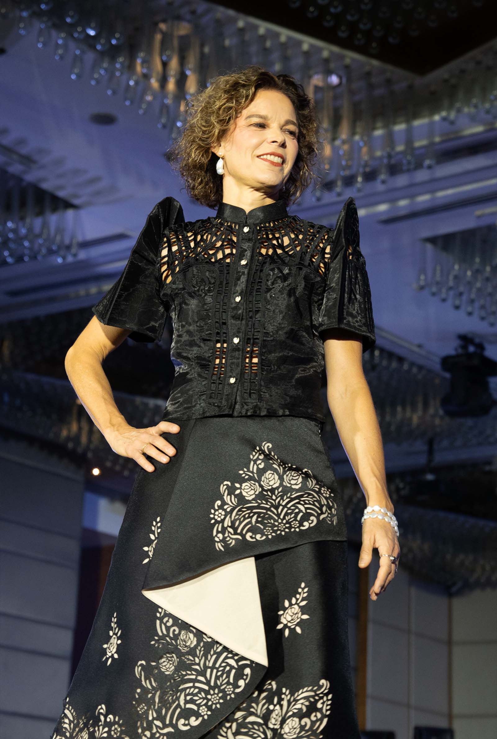 Mme. Prof Dr. Denise Brühl Moser, Spouse of the Ambassador of Switzerland, dressed by Kultura in a cutwork embroidered terno top and laser cut skirt.