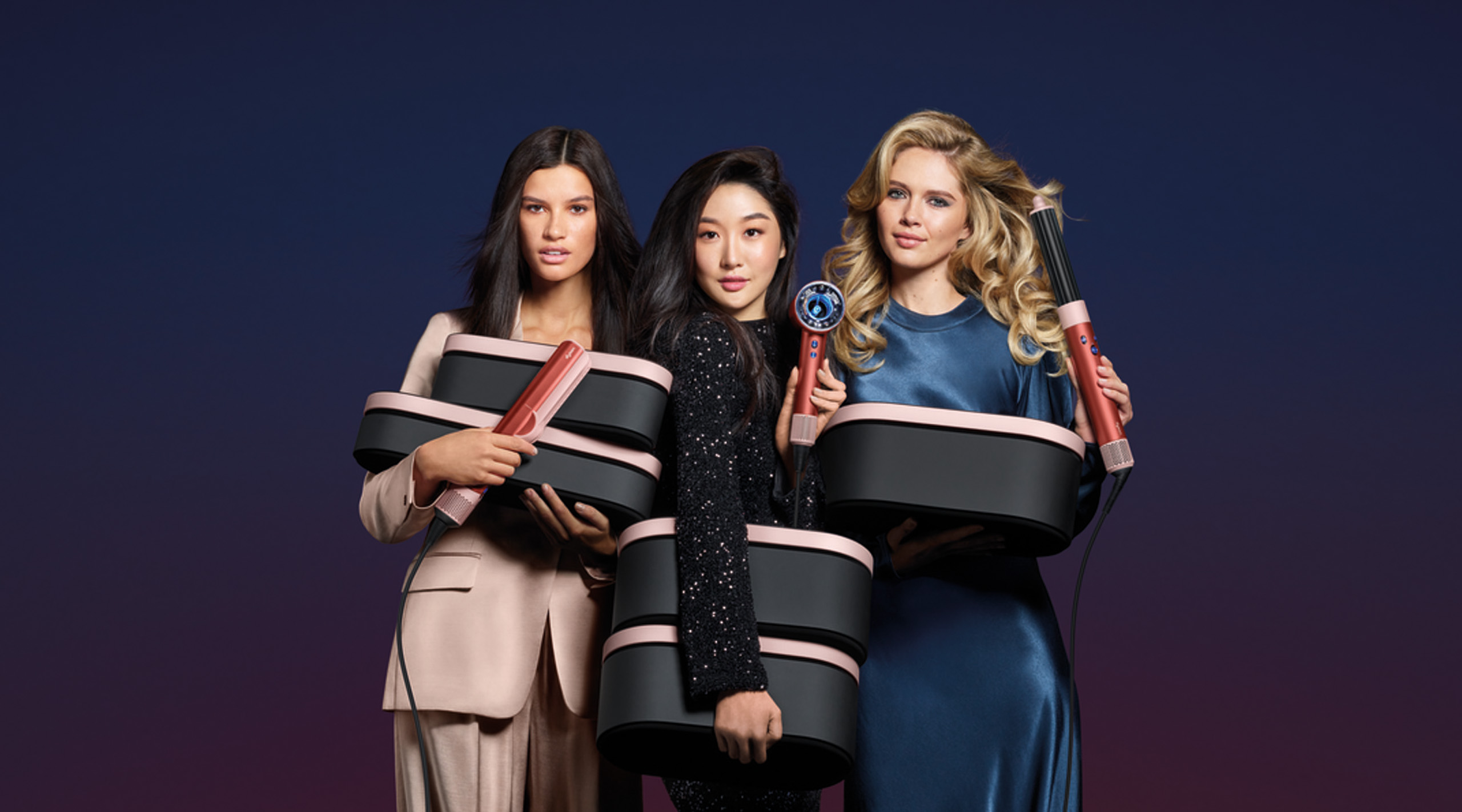 The limited-edition Dyson holiday collection in Strawberry Bronze and Blush Pink