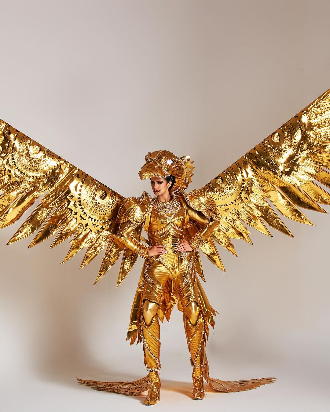 Miss Universe India Rhea Singha as her country's Golden Eagle, a symbol of wealth and prosperity during India's golden age. national costume