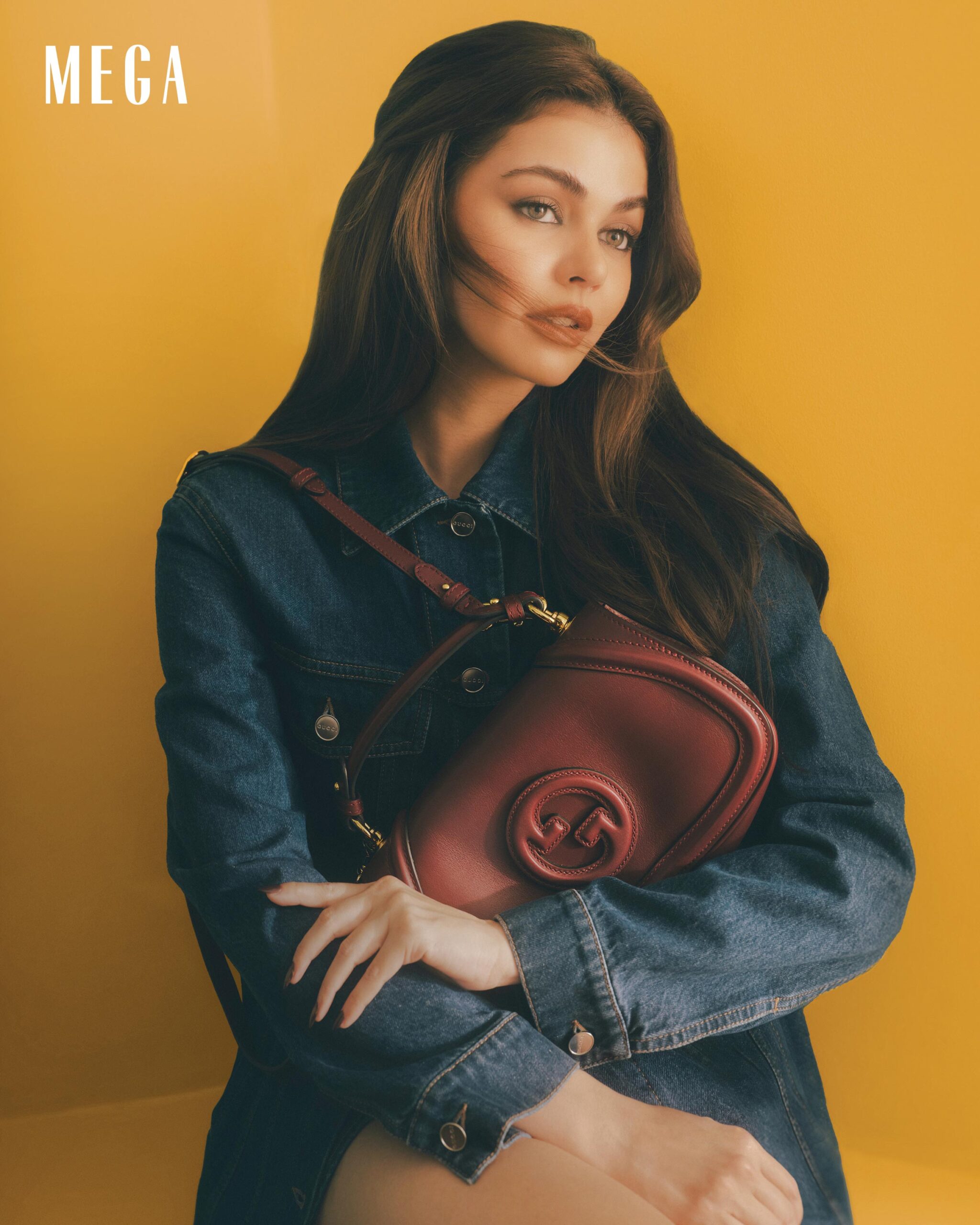 Janine Gutierrez cladded in a GUCCI denim jacket with Gucci print, GUCCI regular denim skirt with laser logo, GUCCI Blondie small top handle bag