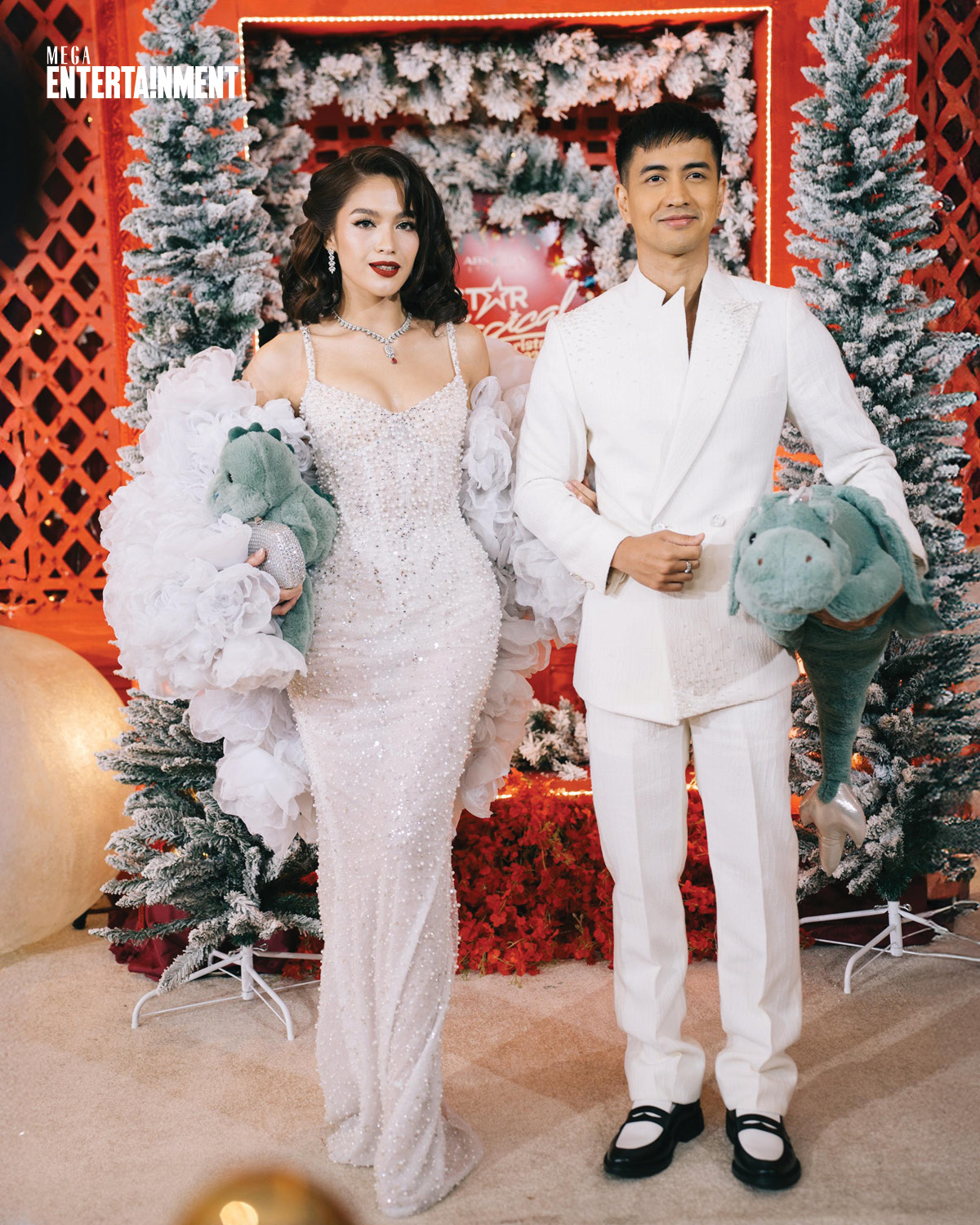 Jane Oineza and RK Bagatsing in matching snow-white outfits, going for Hollywood glamour with a touch of whimsical couple Star Magical Christmas Ball