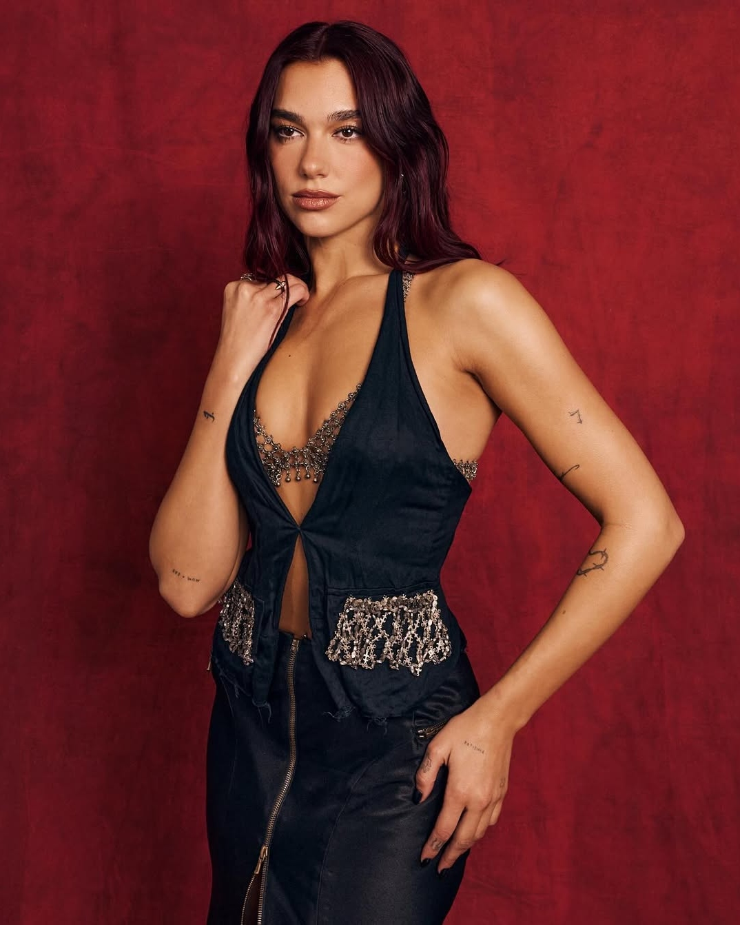 Dua Lipa with cherry red hair