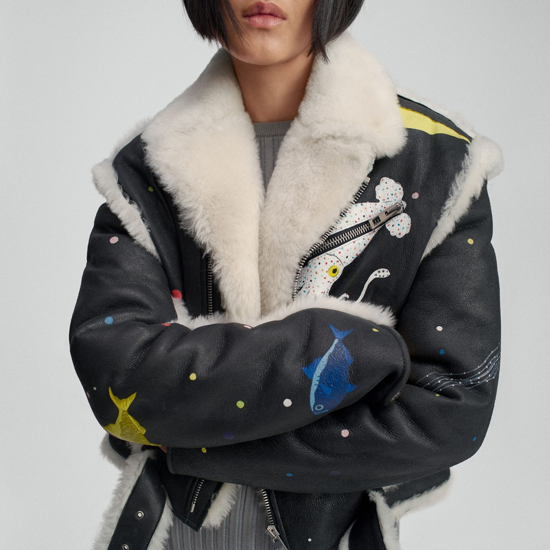 A LOEWE black leather and fur jacket with deep sea characters