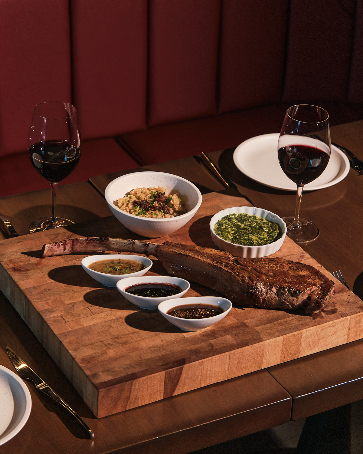 Tomahawk steak with a glass of red wine  Project Vino Reserve food wine restaurant Christmas holidays