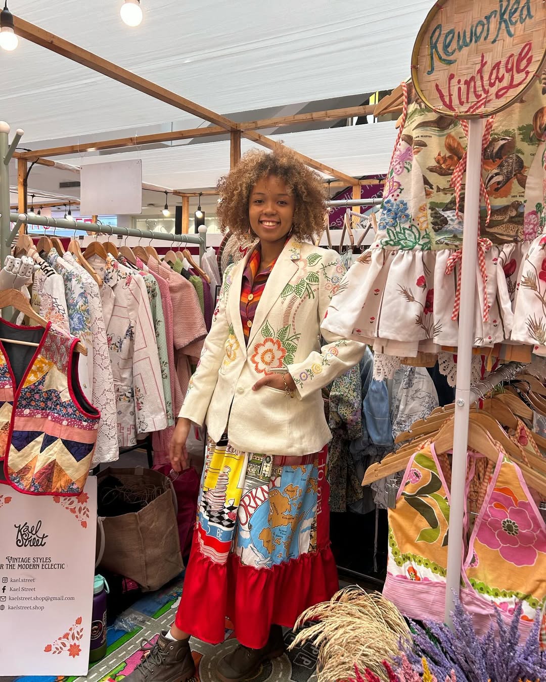 Miki Borinaga wearing her prairie tea towel skirt with a hand embroidered linen blazer with her collection