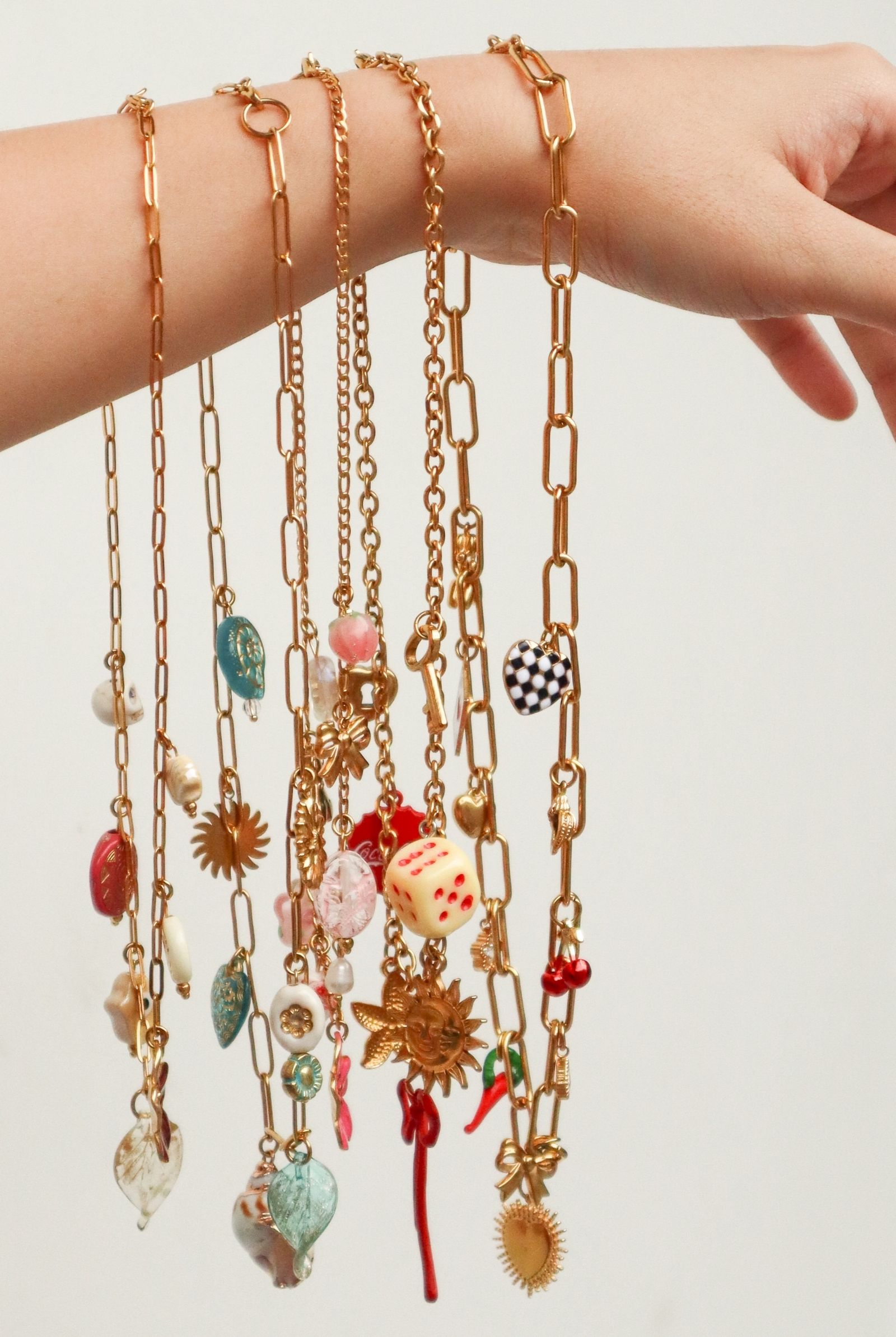 A selection of cute necklace charms to have as an accessory