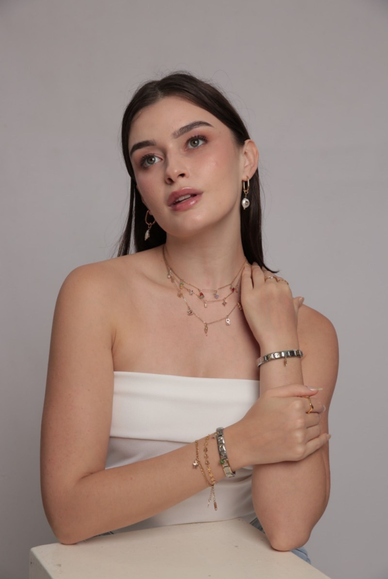 A selection of Solasta accessories styled with a model