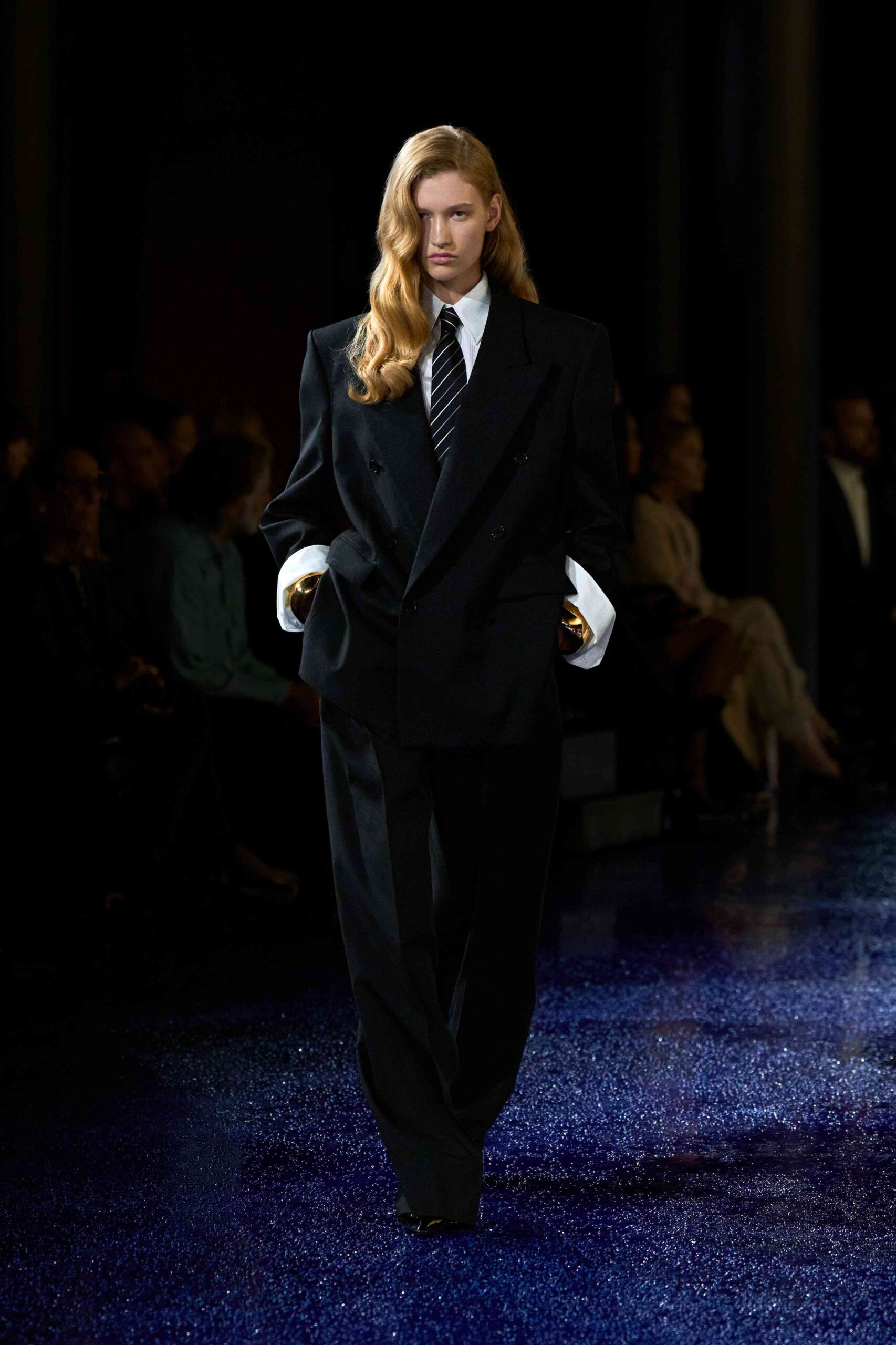 Have someone reserve the boardroom—in the new power suit spotted at the S/S25 shows, the ‘80s look means serious business golden saint laurent