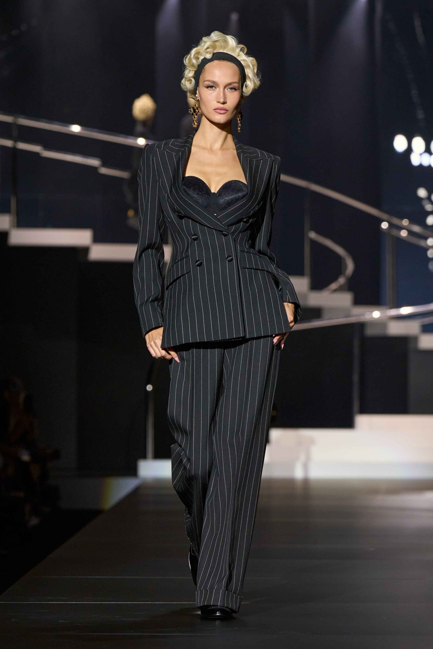 Have someone reserve the boardroom—in the new power suit spotted at the S/S25 shows, the ‘80s look means serious business dolce & gabbana