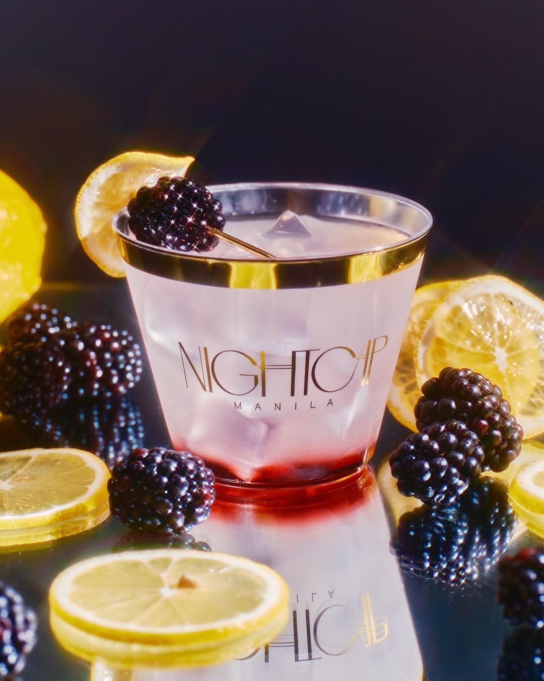 Nightcap's classic cocktail, the Bramble, made of gin, citrus, and blackberry
