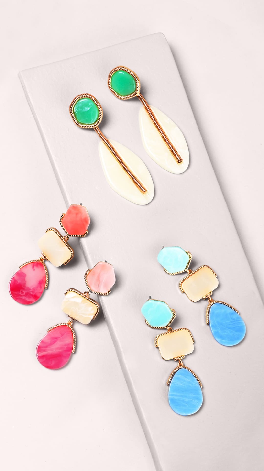 Earrings can be fun, chic, and sophisticated in the summer