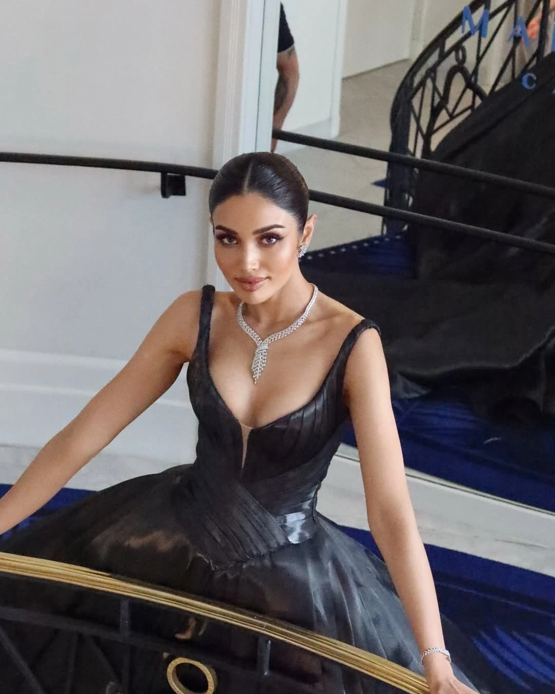 A vision of moonlight, Veena Praveenar paired the gown with aariya diamonds