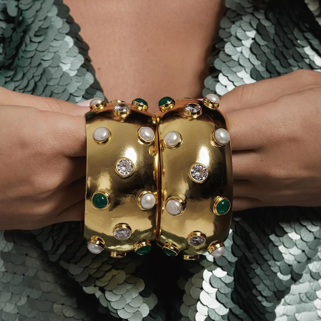 The collections are crafted from recycled brass, locally sourced stones, and thoughtful packaging