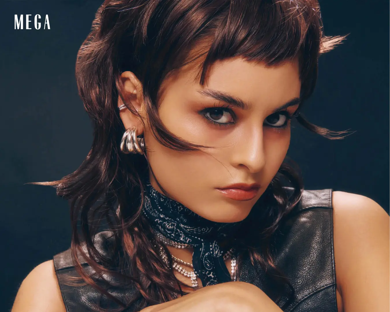 the wolf cut is A mashup of the shag and mullet