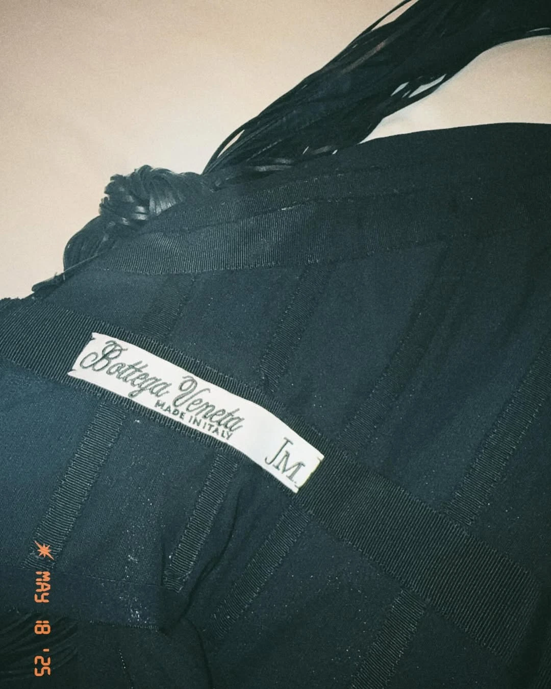 julianne moore's initials STITCHED TO THE TAG of the black dress