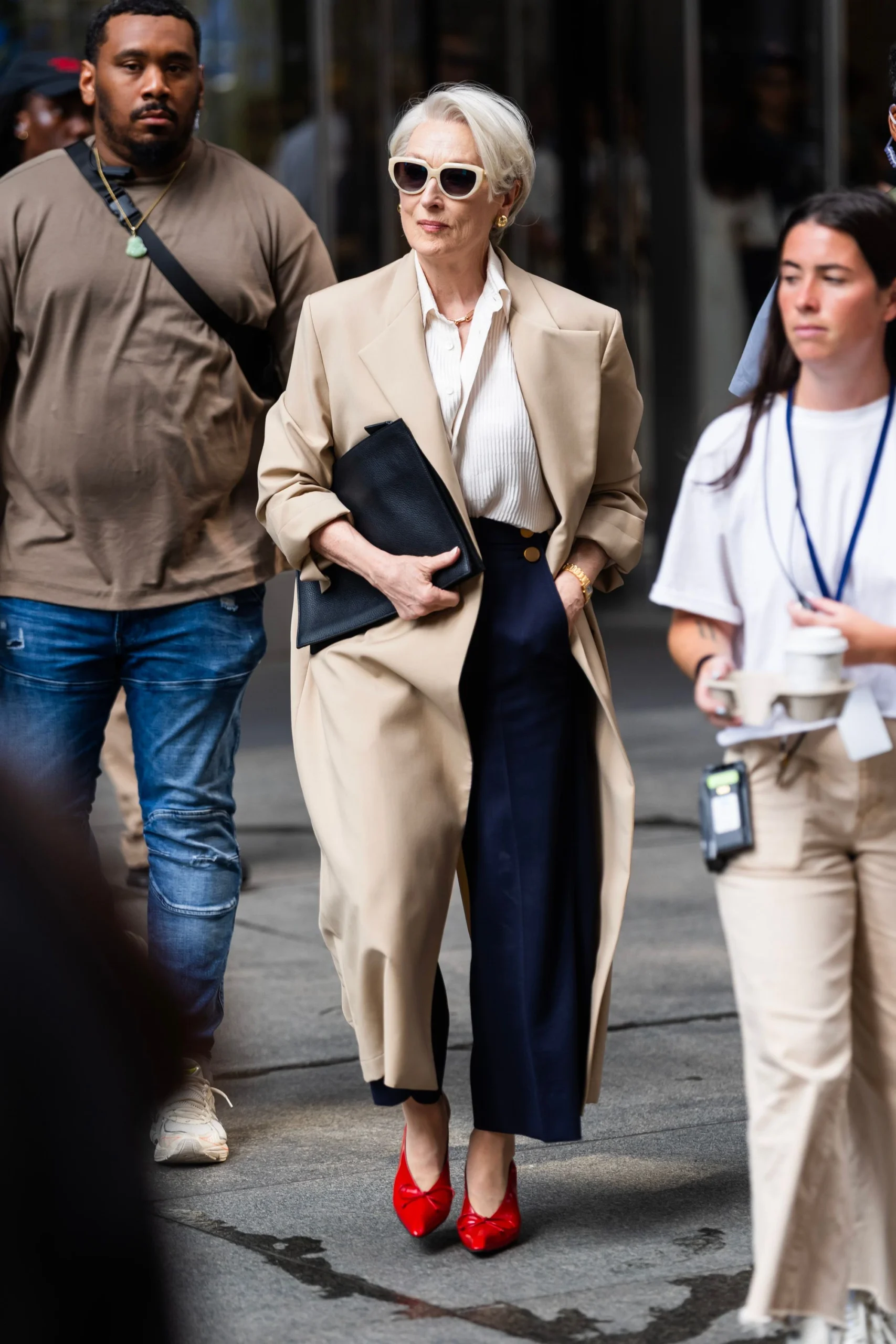 In max mara trousers, CARTIER watch, tiffany & co sunglasses, and jacquemus heels Meryl Streep Devil wears Prada 2