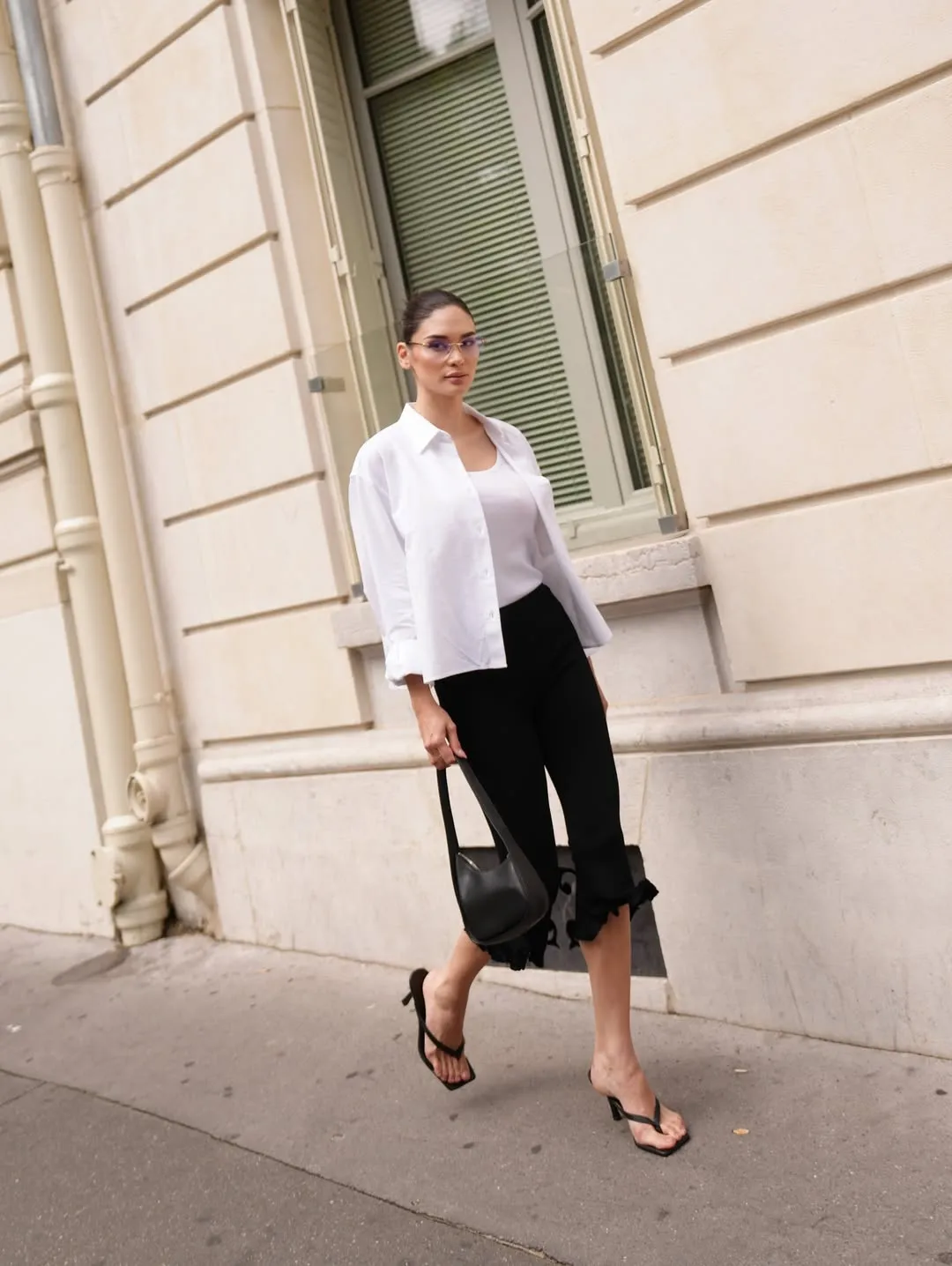 Pia Wurtzbach wearing Sandro with the row half moon bag