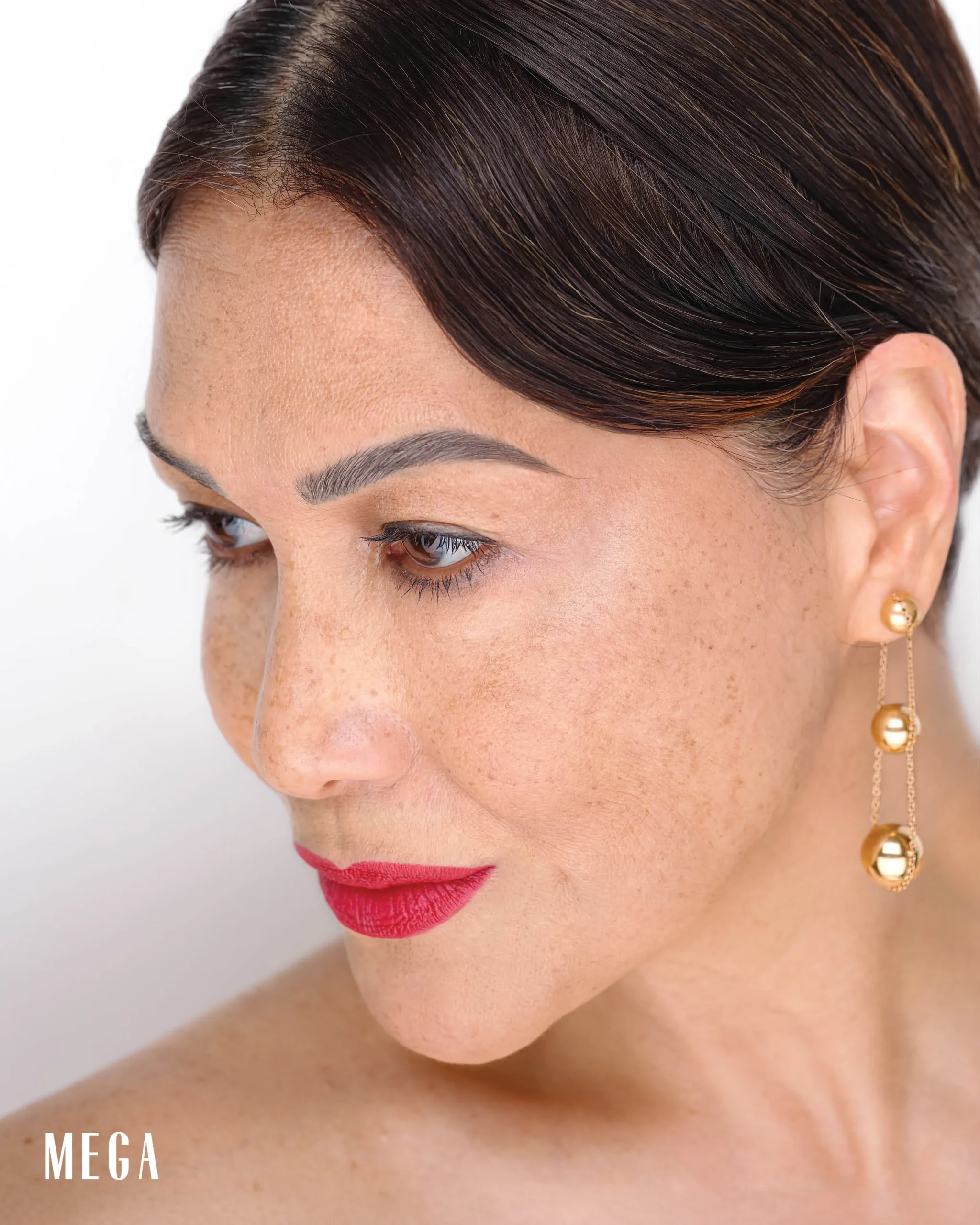 “Mature lips tend to be drier and may have issues with fine lines so it’s also best to use a sugar scrub to exfoliate dry lips before applying red lipstick," SAYS LALA FLORES