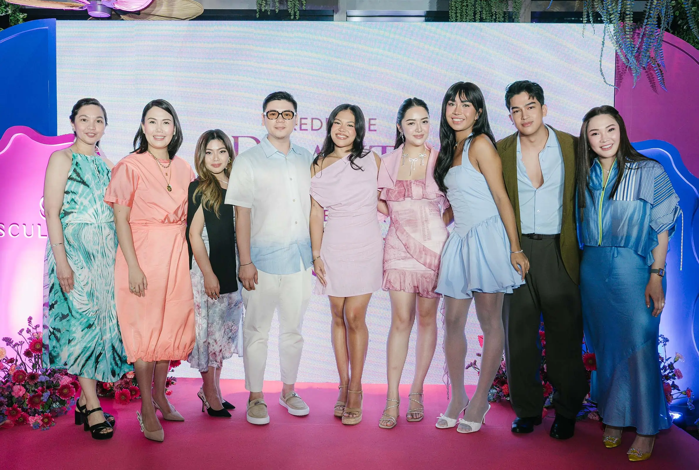 A lineup of representatives for Galderma and One Nadela stand with Shape Up's band of creators